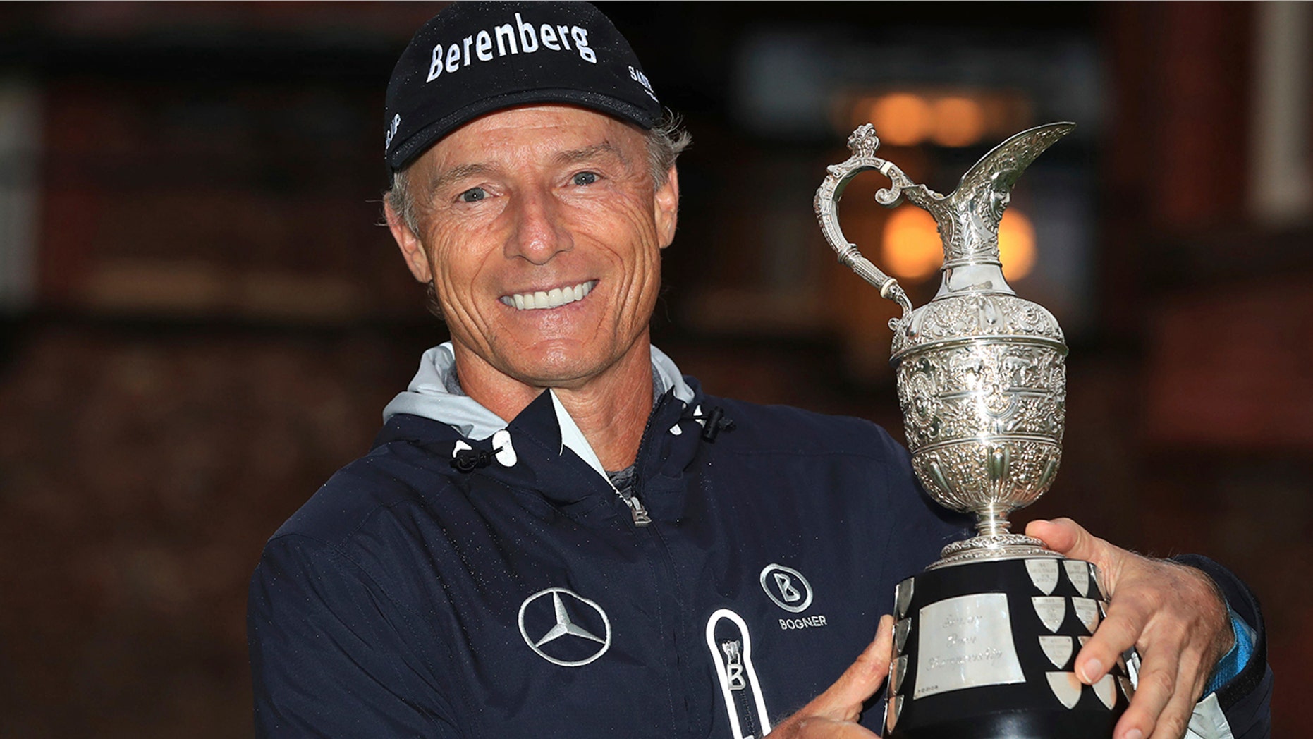 Bernhard Langer poses with the trophy after winning the senior Open golf tournament at Royal Lytham & St Annes Golf Club, in Lytham, England, Sunday July 28, 2019. (Peter Byrne/PA via AP)