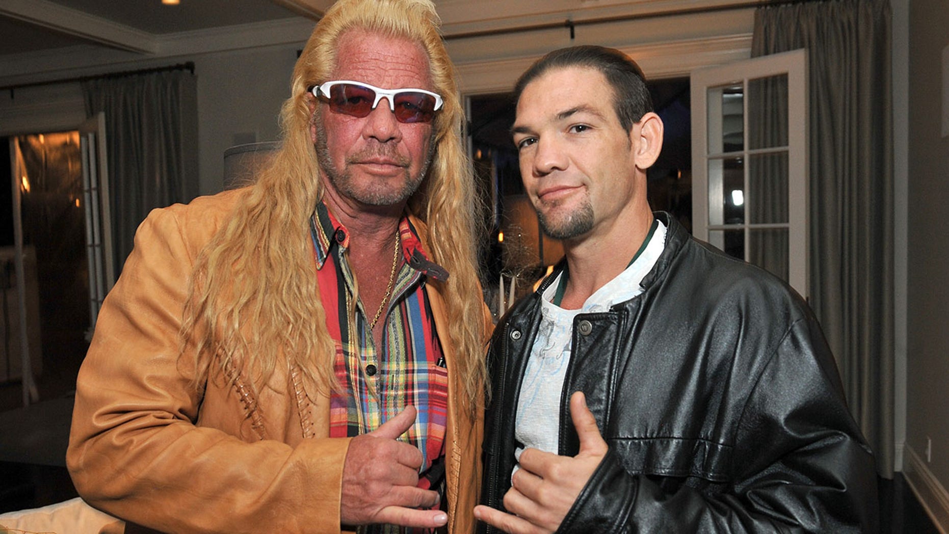 Los Angeles, CA - Dec. 12: Dog Chapman and Leland Chapman attend the 2013 Electus & amp; College Humor Holiday Party at a private residence on December 12, 2013 in Los Angeles, California. (Photo by Angela Weiss / Getty Images for Electus)