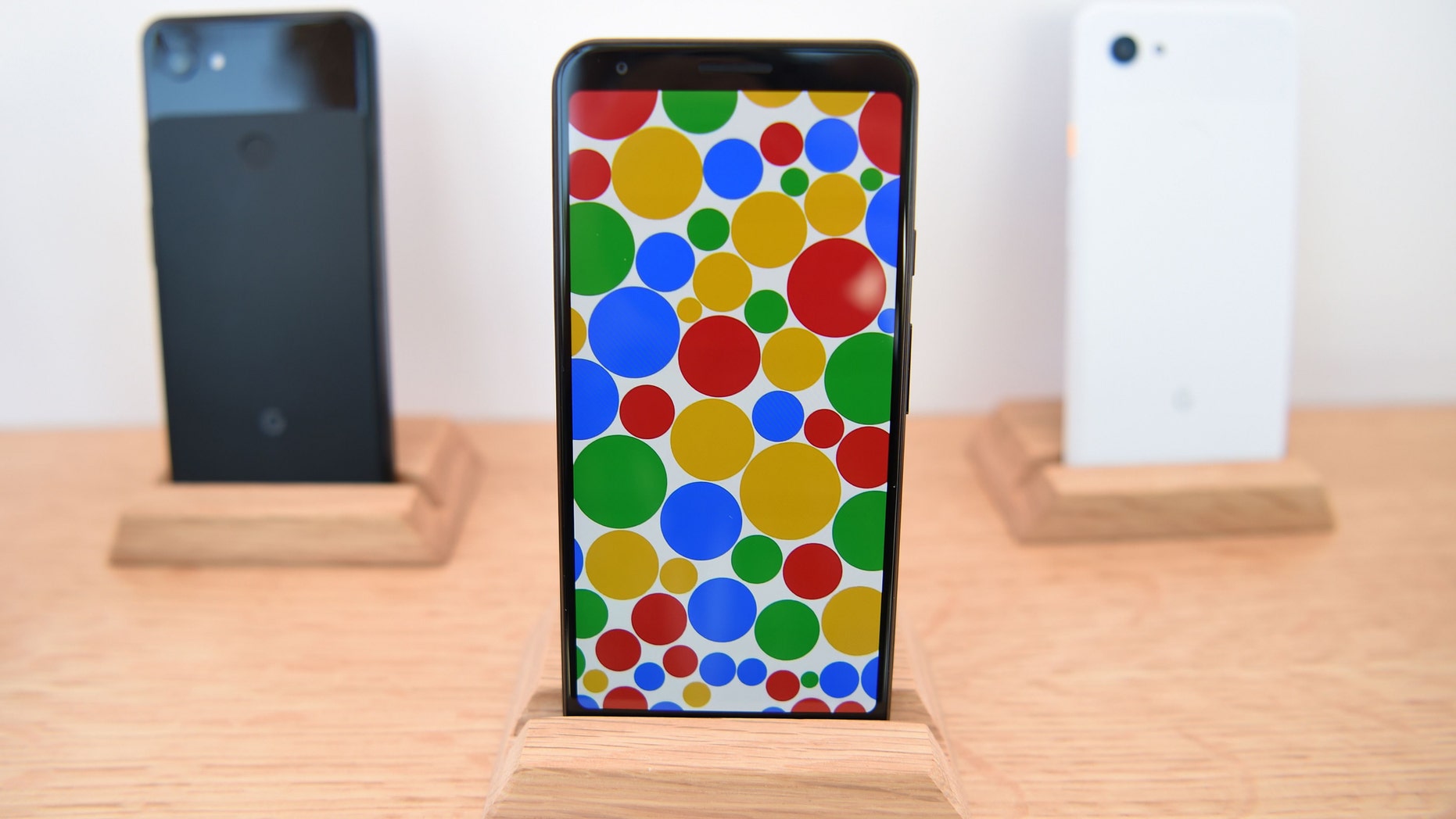 File photo - A Google Pixel 3a phone (C) is displayed during the Google I/O conference at Shoreline Amphitheatre in Mountain View, California on May 7, 2019.