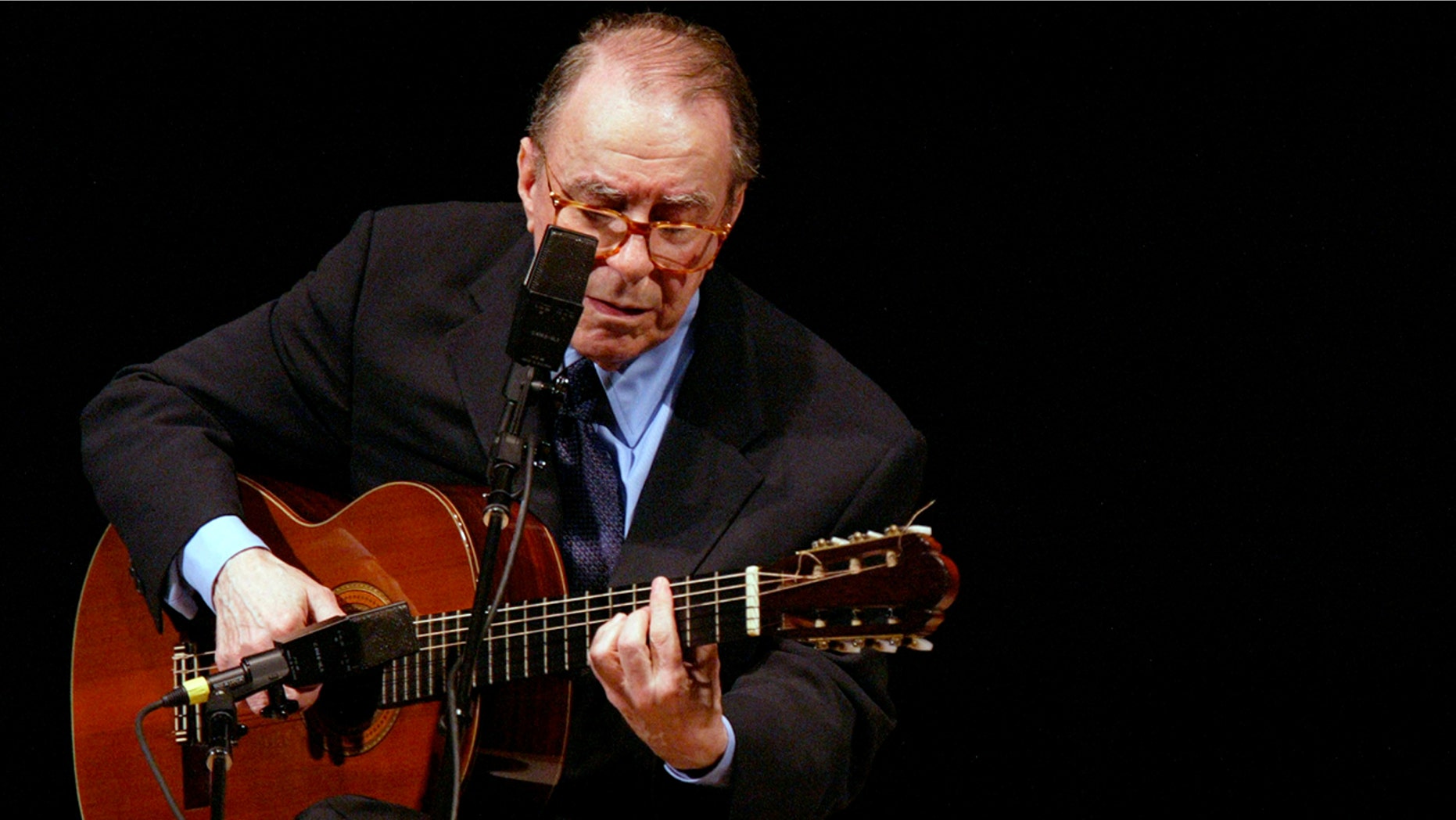 In this June 18, 2004 file photo, Brazilian composer Joao Gilberto performs at Carnegie Hall, in New York. (AP Photo/Mary Altaffer, File)