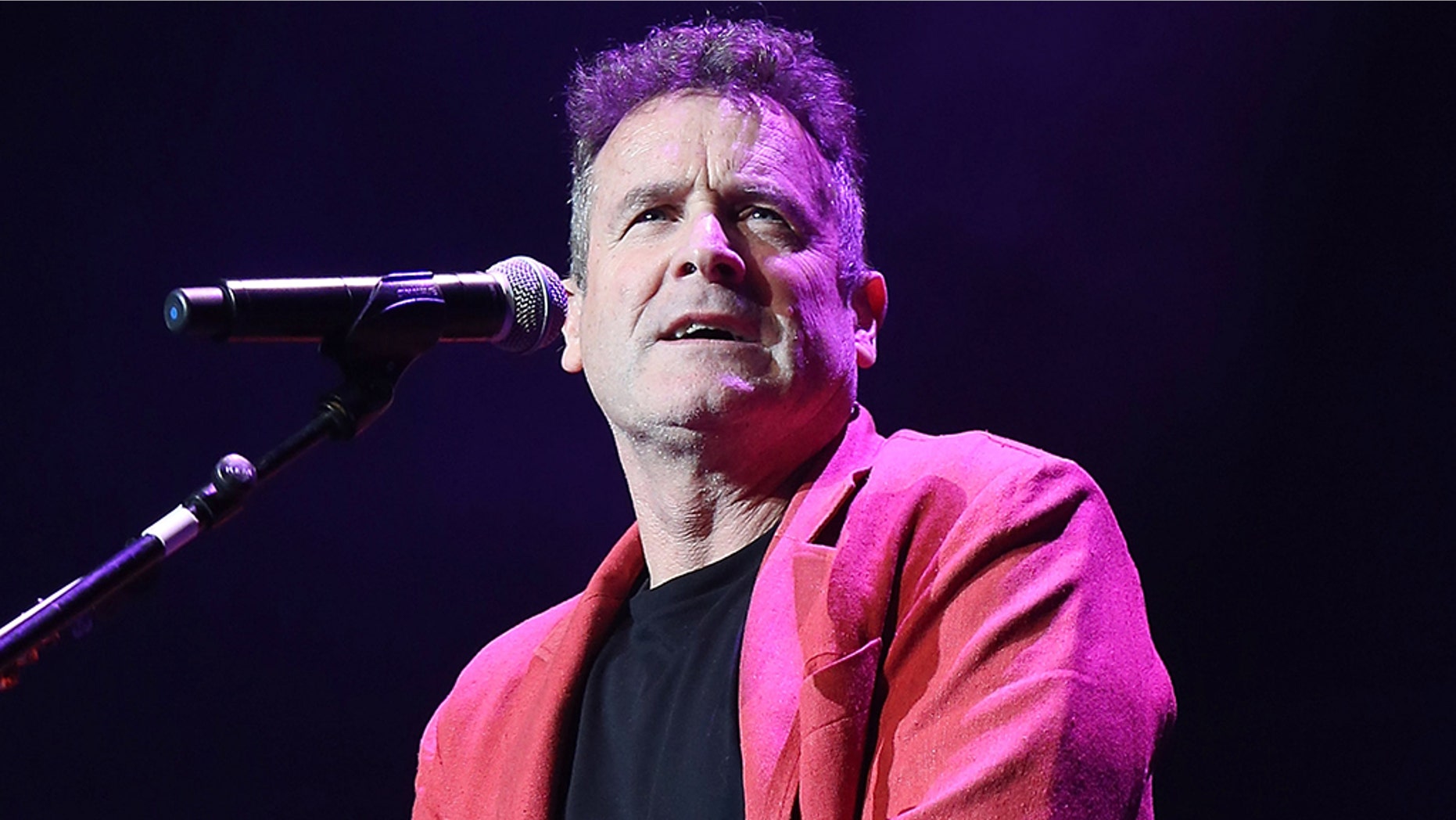 Johnny Clegg performs on stage at Royal Albert Hall on March 27, 2013 in London, England.