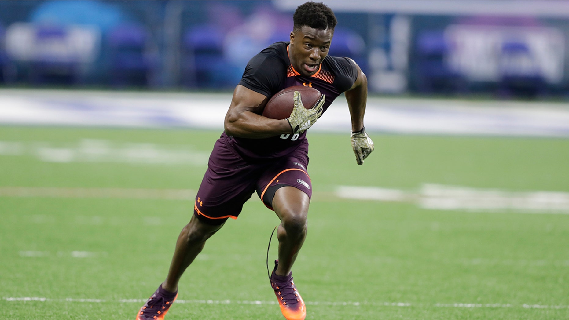 FILE - In this March 4, 2019 file photo Washburn defensive back Corey Ballentine runs a drill during the NFL football scouting combine in Indianapolis. The New York Giants cornerback who was wounded hours after being drafted in an April shooting that claimed the life of his Washburn University teammate is trying to make a career in the NFL not only for himself but also his late best friend. (AP Photo/Darron Cummings, file)