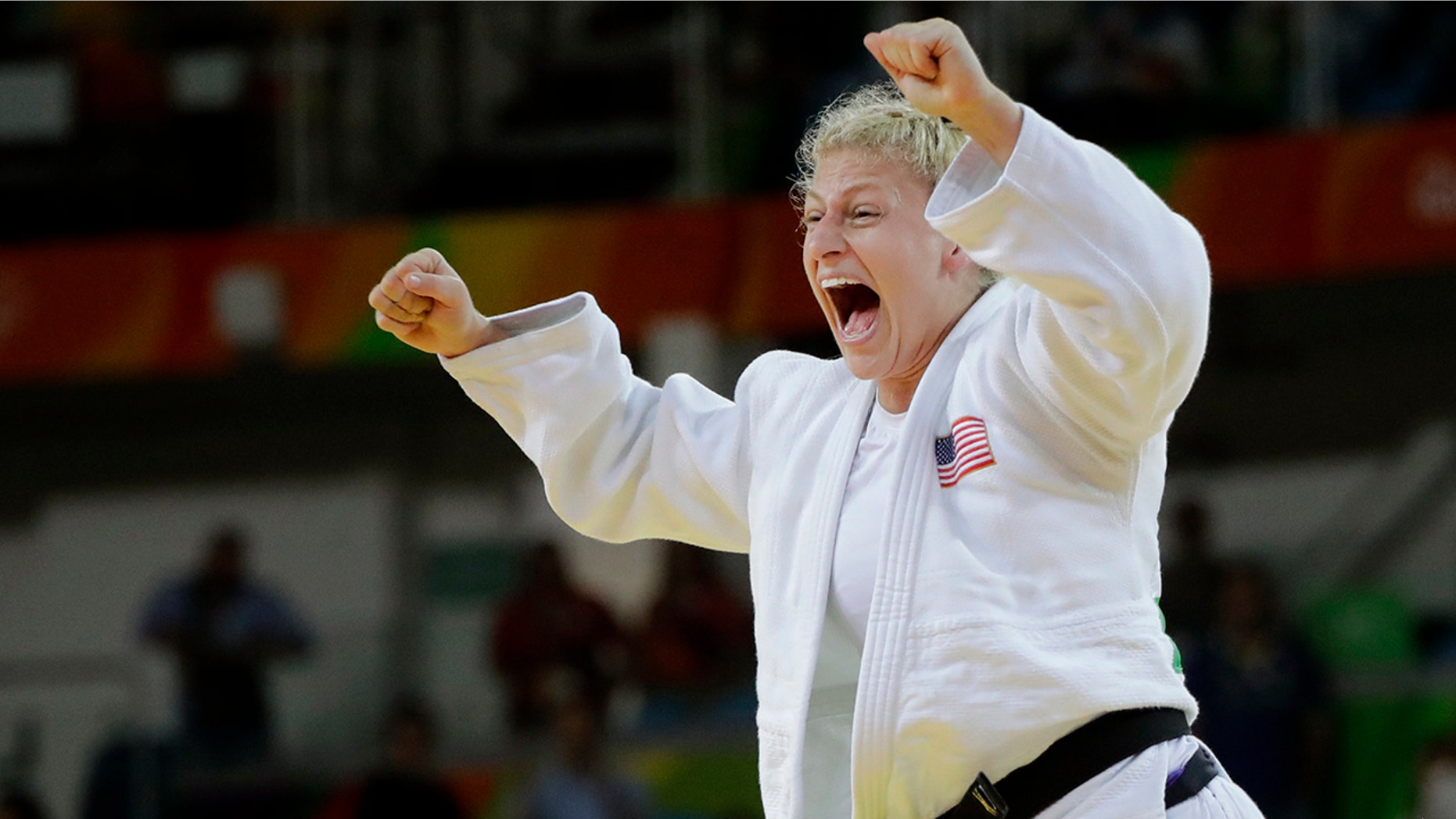 FILE - In this Thursday, Aug. 11, 2016, file photo, United States' Kayla Harrison celebrates after defeating France's Audrey Tcheumeo in the women's 78-kg judo gold medal match at the 2016 Summer Olympics in Rio de Janeiro, Brazil. Harrison improved to 5-0 in her short MMA career, Thursday, July 11, 2019, in Atlantic City, N.J., and remains in the hunt to win $1 million as PFL’s lightweight champion. Harrison made Morgan Frier tap out in the first round of their fight on the PFL4 card. (AP Photo/Jae C. Hong, File)