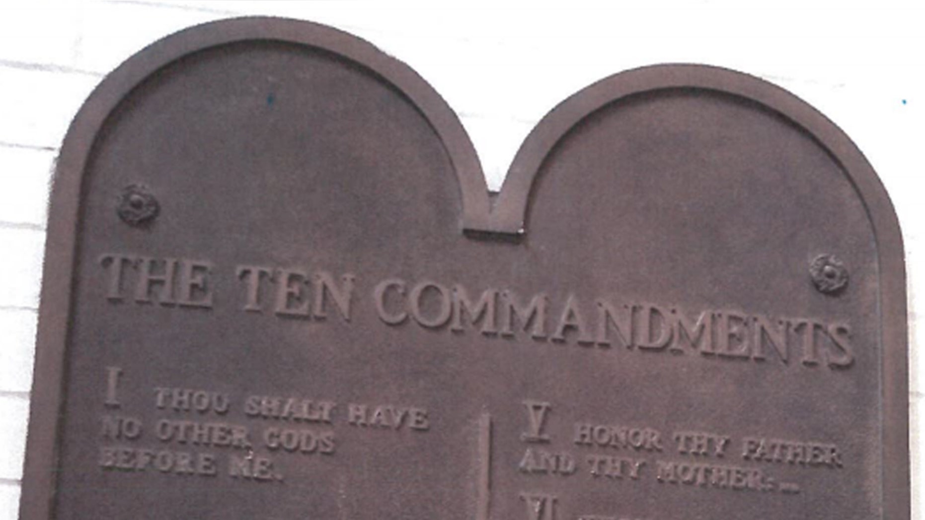 The New Philadelphia City Schools in Ohio removed a 92-year-old Ten Commandments plaque after the Freedom From Religion Foundation complained.