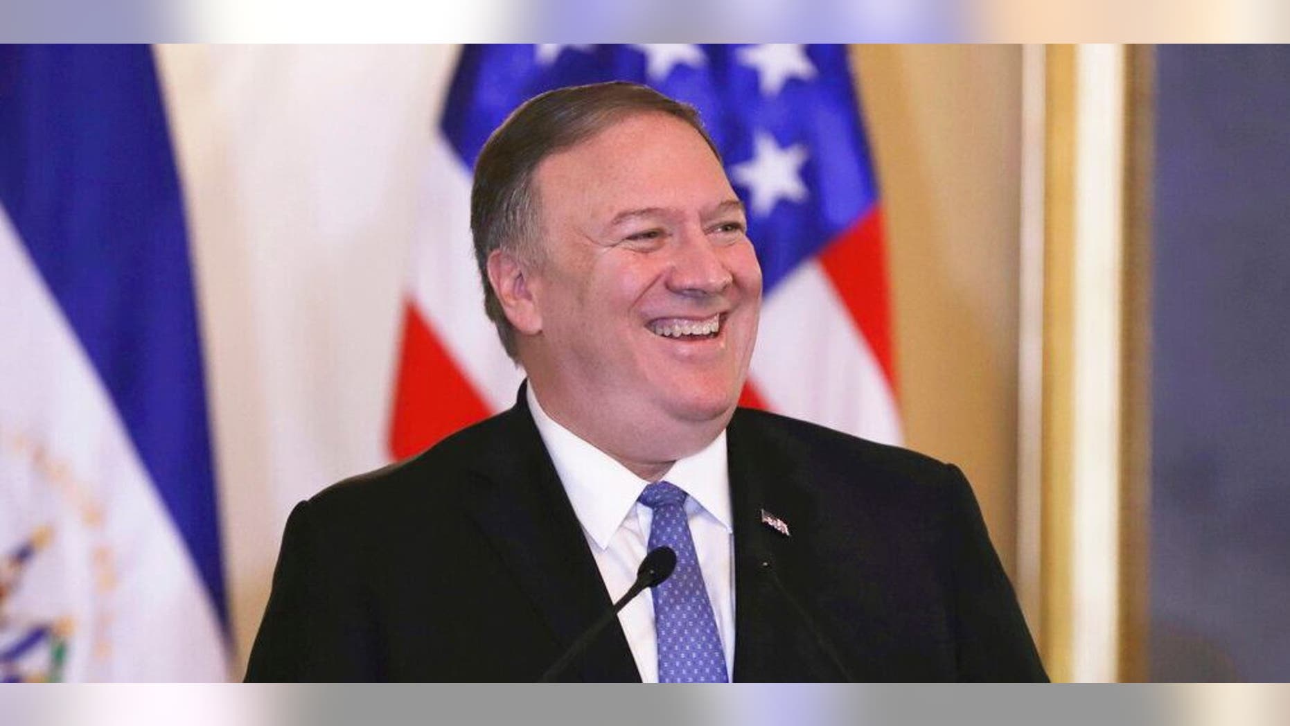 U.S. Secretary of State Mike Pompeo reacts as El Salvador's President Nayib Bukele speaks at the Presidential House in San Salvador, El Salvador, Sunday, July 21, 2019. Pompeo ends his Latin American tour in this Central American country. (AP Photo/Salvador Melendez)