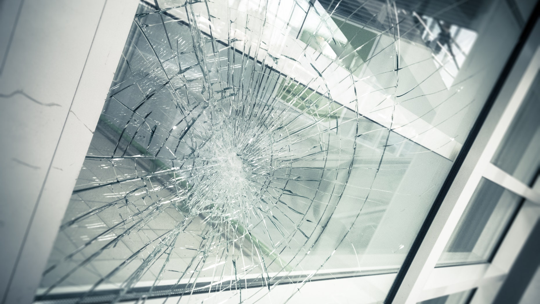 The boy said that, about four weeks earlier, he had injured his face when he crashed into a glass window after fainting.
