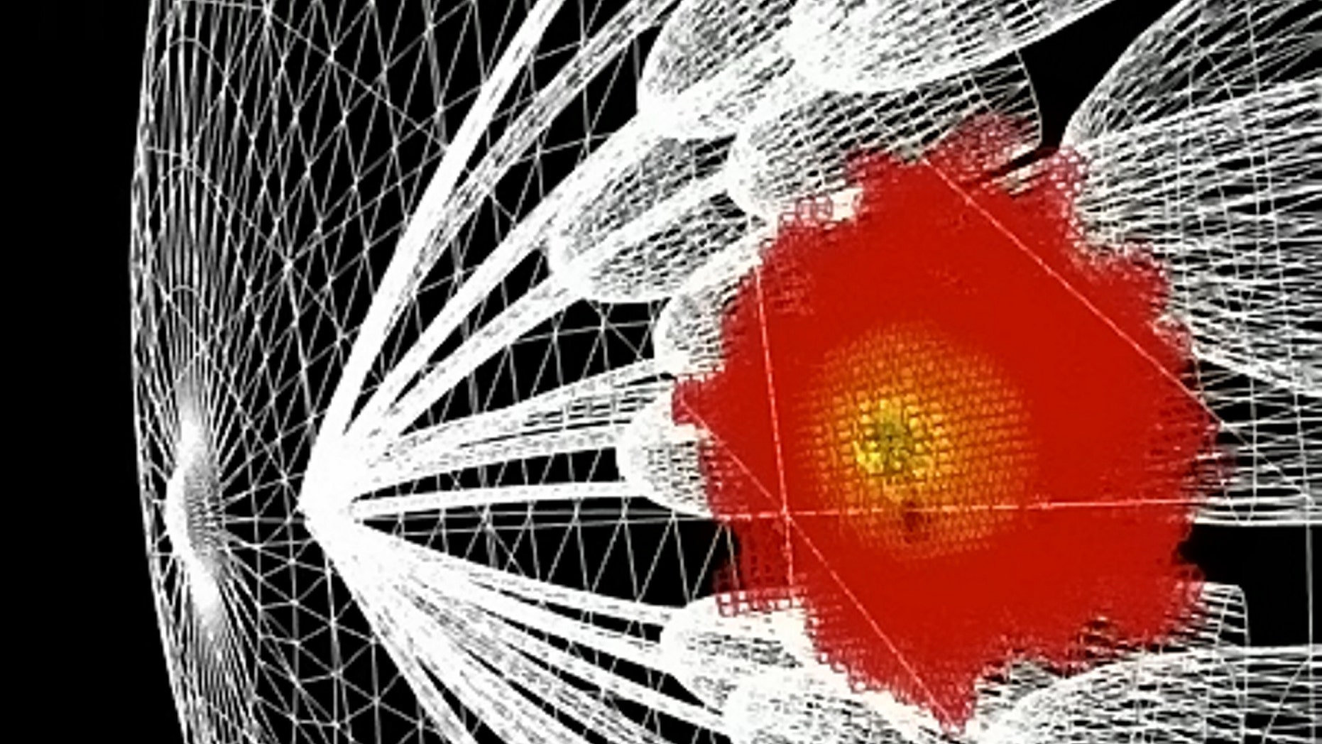 A model showing light (red/yellow) penetrating the surface of the human breast (white triangles). Techniques developed by astronomers to understand space could help fight against breast and skin cancer, according to new research. (Credit: SWNS)
