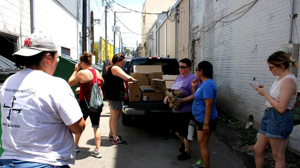 Abby Johnson and others getting ready to unload supplies at the respite center in McAllen, Texas.