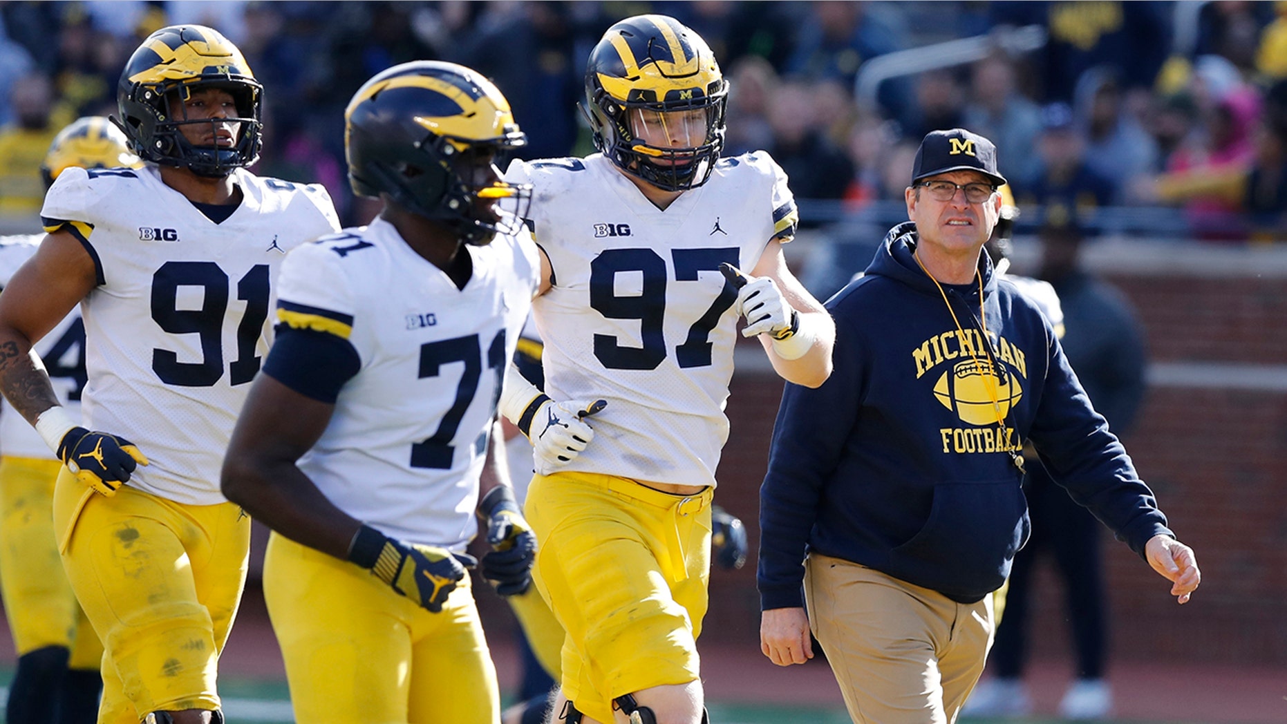 Jim Harbaugh seems to be set up for success at Michigan in his fifth season, leading a program that is a popular choice to win the Big Ten. "That's where I would pick us," Harbaugh said. Some are predicting the Wolverines will earn a spot in the College Football Playoff to give them a chance to win a national championship for the first time since 1997. (AP Photo/Carlos Osorio, File)