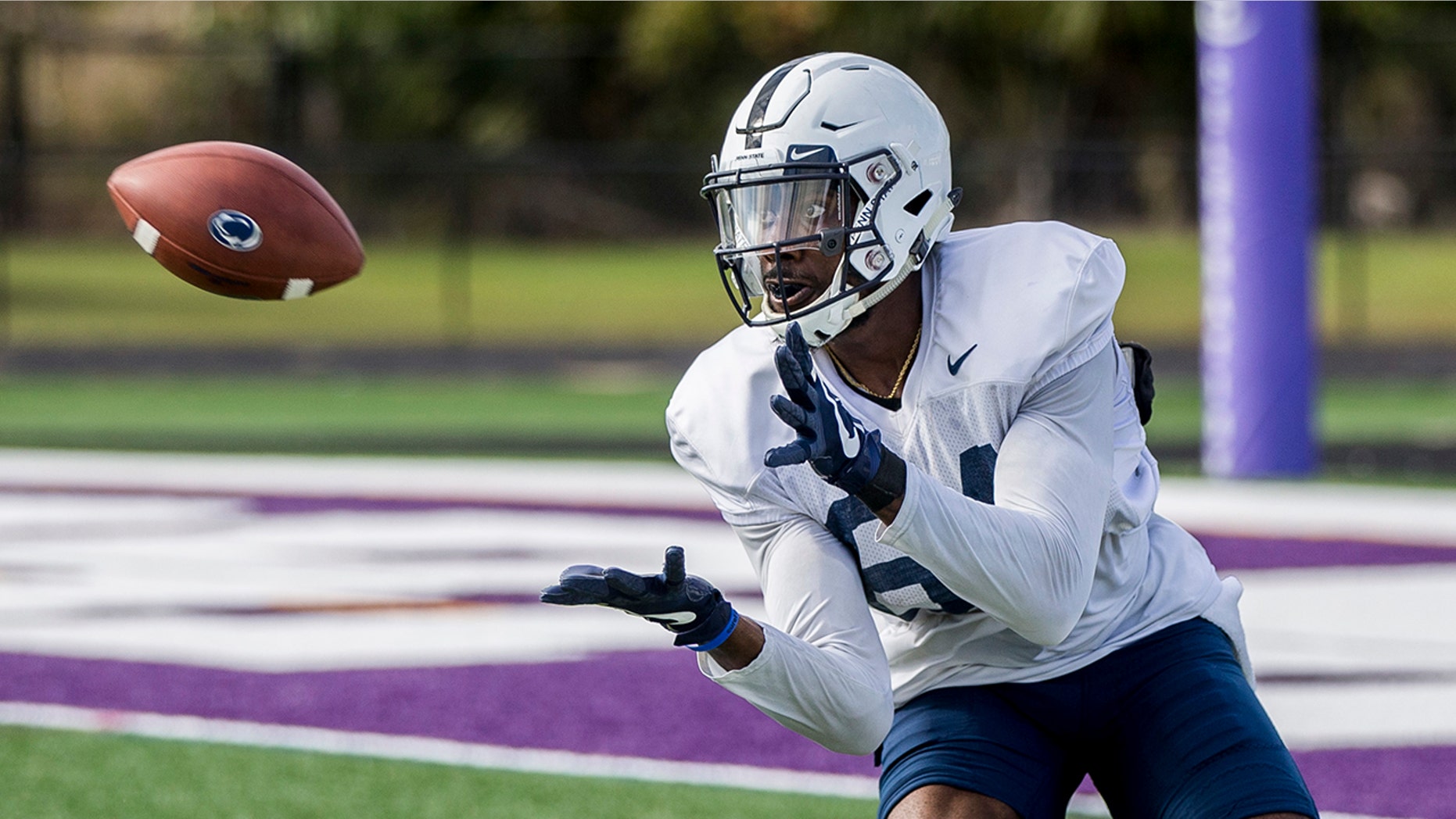 FILE - In this Dec. 29, 2018, file photo, Penn State wide receiver Juwan Johnson hauls in a pass during practice for the Citrus Bowl NCAA college football game in Orlando, Fla. (Joe Hermitt/The Patriot-News via AP, File)