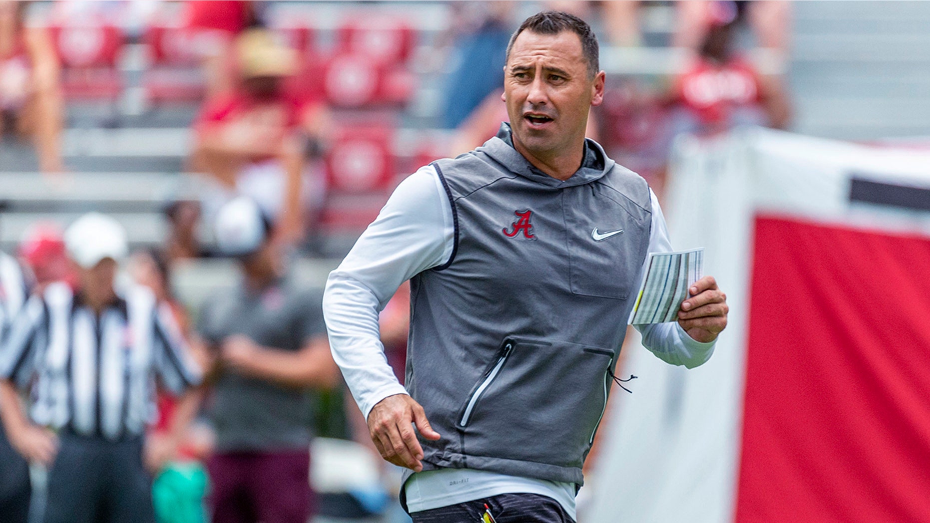 Alabama offensive coordinator Steve Sarkisian works his payers through drills during an NCAA college fall camp fan-day college football scrimmage, Saturday, Aug. 3, 2019, at Bryant-Denny Stadium in Tuscaloosa, Ala. (AP Photo/Vasha Hunt)