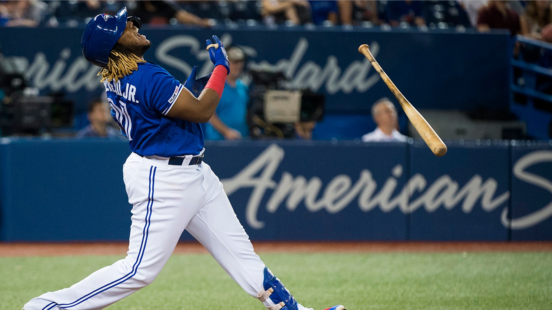 Toronto Blue Jays designated hitter Vladimir Guerrero Jr. reacts after hitting a pop flyout during ninth-inning baseball game action against the Tampa Bay Rays in Toronto, Sunday, July 28, 2019. (Nathan Denette/The Canadian Press via AP)