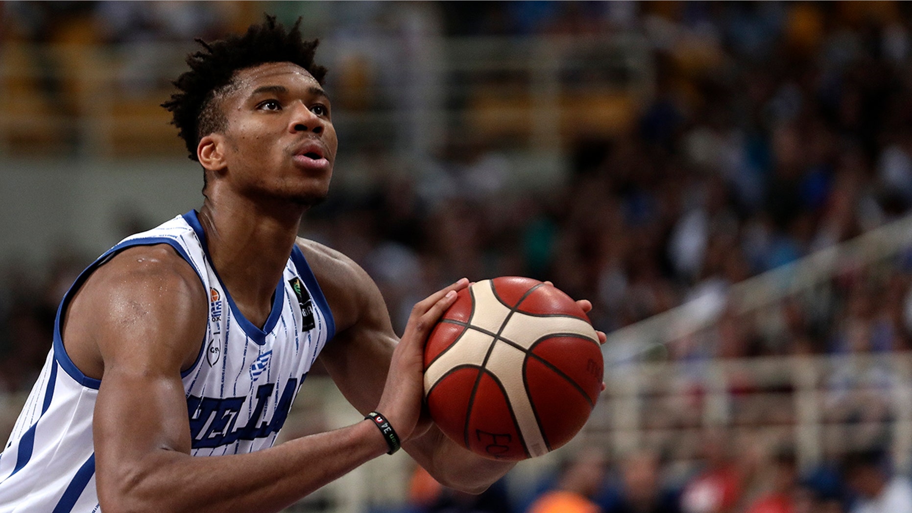 Greece's Giannis Antetokounmpo, of the Milwaukee Bucks, prepares for a free throw, during a game against Italy, at the Acropolis basketball tournament at the indoor Olympic stadium of Athens, Friday, Aug. 16, 2019. (AP Photo/Yorgos Karahalis)