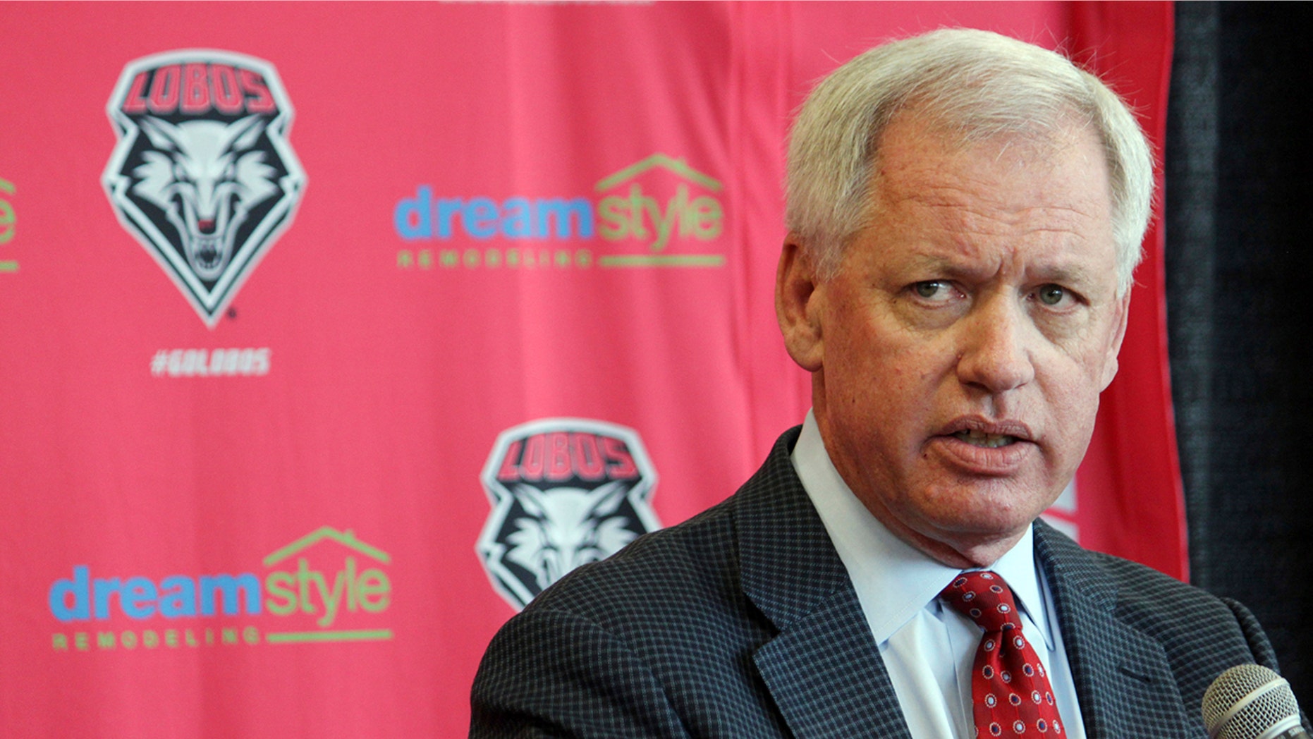 FILE - In this May 3, 2017, file photo, then-University of New Mexico athletics director Paul Krebs answers questions during a news conference in Albuquerque, N.M. Documents filed Wednesday, Aug. 21, 2019, in state district court show that a grand jury indicted the Krebs, 63, on embezzlement, larceny, and tampering charges in connection with an investigation into questionable spending by the school's troubled athletics department. (AP Photo/Susan Montoya Bryan, File)