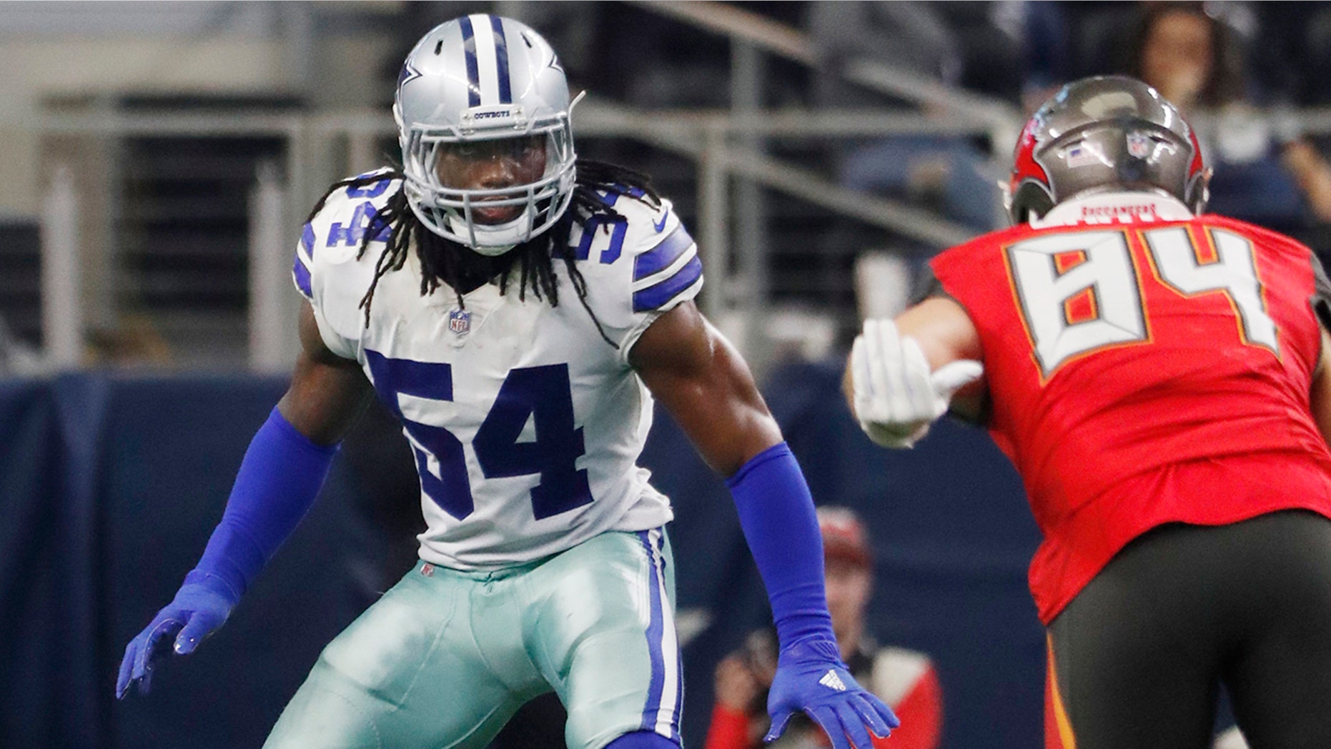 FILE - In this Sunday, Dec. 23, 2018 file photo, Dallas Cowboys linebacker Jaylon Smith against the Tampa Bay Buccaneers during an NFL game in Arlington, Texas. The Dallas Cowboys have given young linebacker Jaylon Smith a new contract while the holdout by Pro Bowl running back Ezekiel Elliott nears a month since the team reported to training camp. Smith’s extension was announced Tuesday, Aug. 20, 2019. (AP Photo/Andy Jacobsohn, File)
