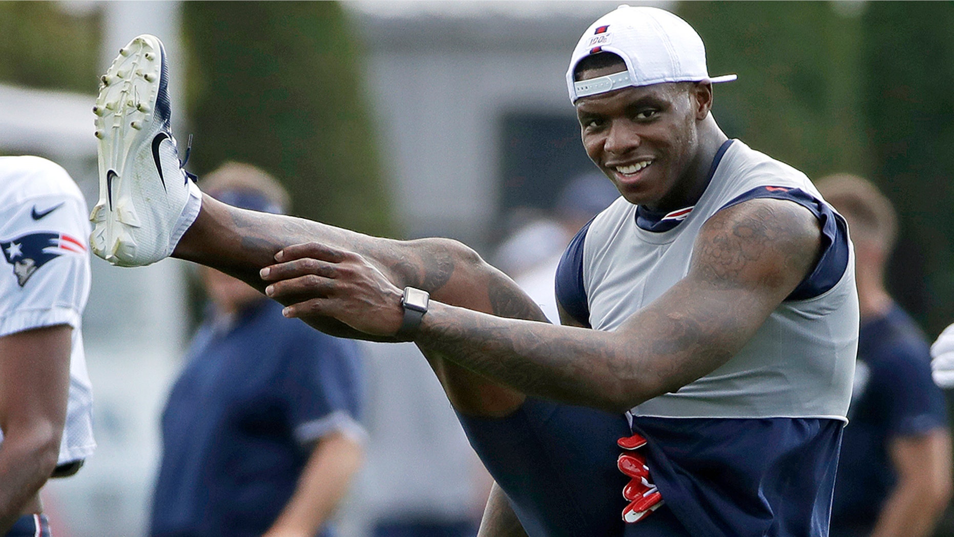 New England Patriots wide receiver Josh Gordon warms up at NFL football practice, Monday, Aug. 19, 2019, in Foxborough, Mass. (AP Photo/Elise Amendola)