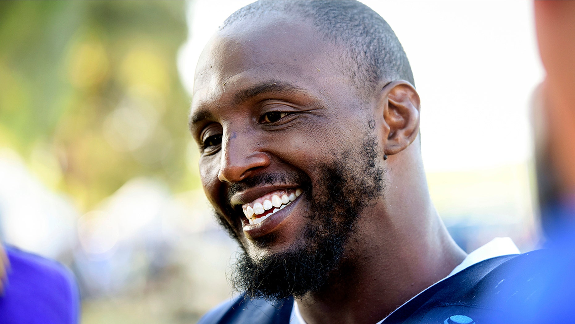 Dallas Cowboys defensive end Robert Quinn talks with reporters at the NFL football team's training camp in Oxnard, Calif., Monday, July 29, 2019. (AP Photo/Michael Owen Baker)