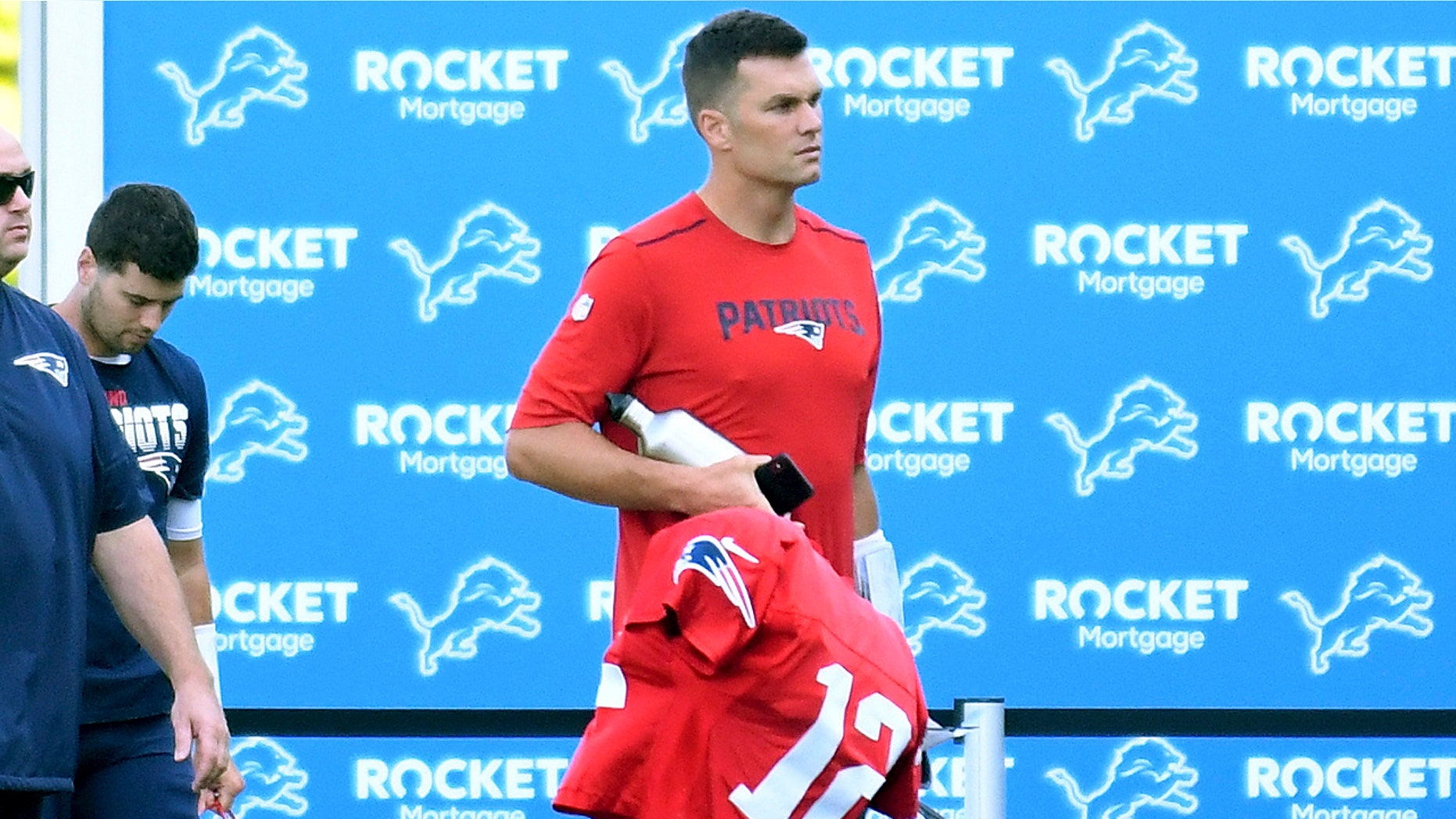 New England Patriots quarterback Tom Brady arrives by bus to the Detroit Lions' NFL football training facility in Allen Park, Mich., Monday, Aug. 5, 2019. (Daniel Mears/Detroit News via AP)