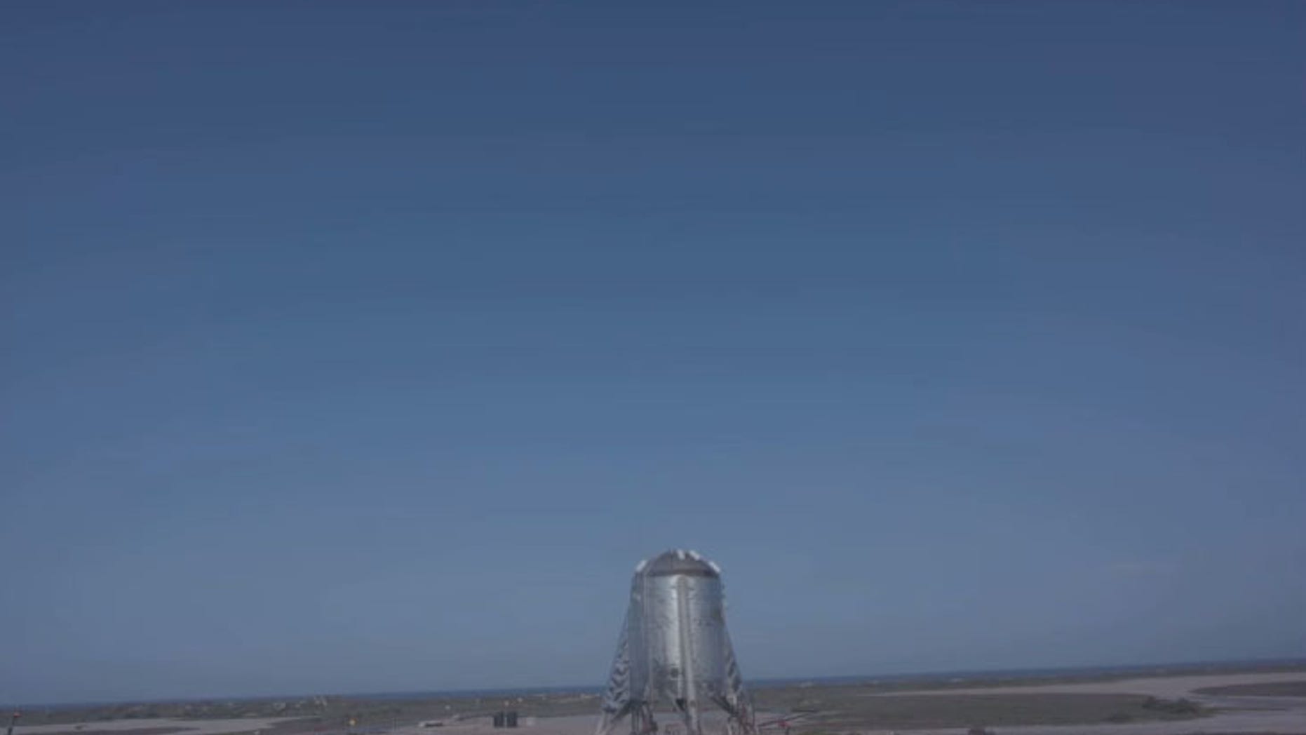 SpaceX's Starhopper prototype is seen just after a launch abort at the company's South Texas test site near Boca Chica Village on Aug. 26, 2019.