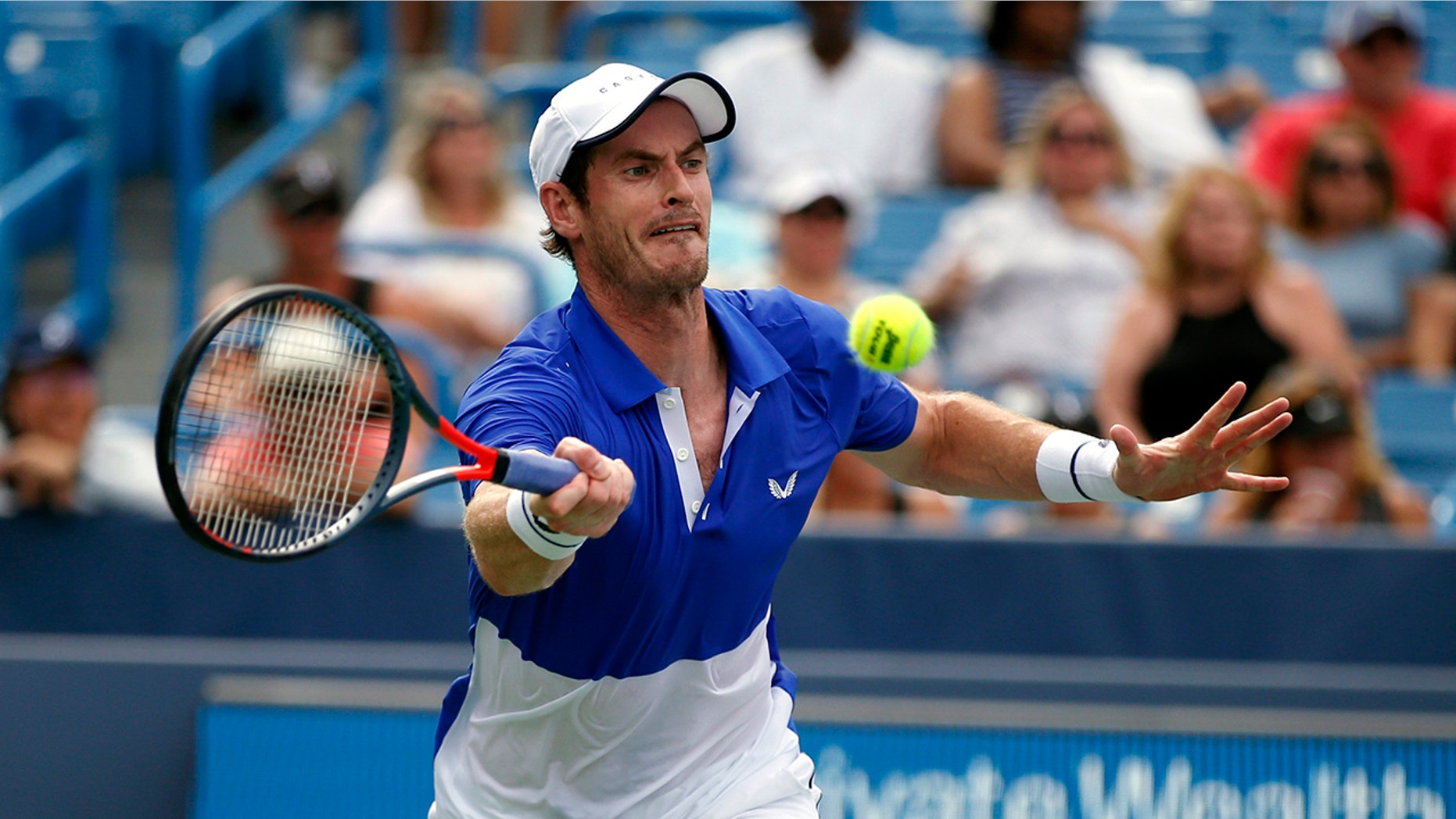 Andy Murray, of Britain, returns a shot against Richard Gasquet, of France, during first-round play at the Western & Southern Open tennis tournament Monday, Aug. 12, 2019, in Mason, Ohio. (AP Photo/Gary Landers)