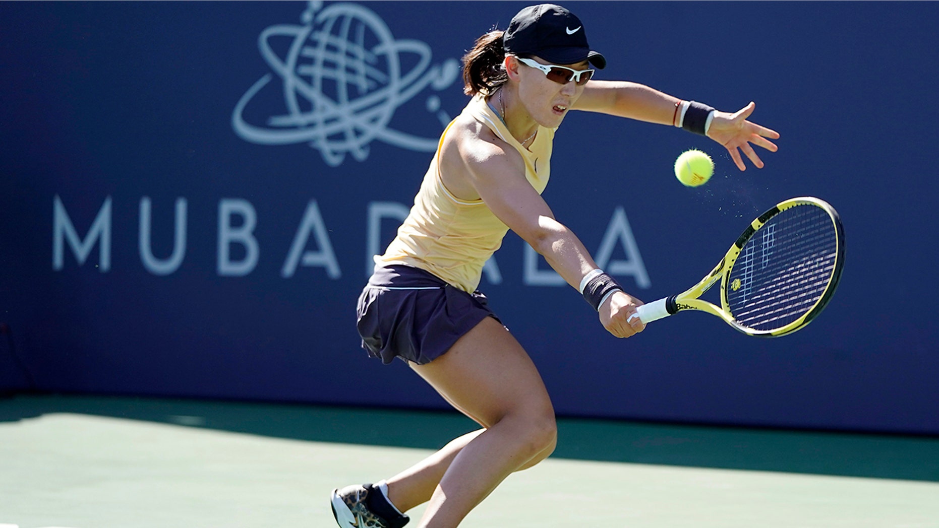 Zheng Saisai, of China, returns the ball to Aryna Sabalenka, of Belarus, during the finals of the Mubadala Silicon Valley Classic tennis tournament in San Jose, Calif., Sunday, Aug. 4, 2019. (AP Photo/Tony Avelar)
