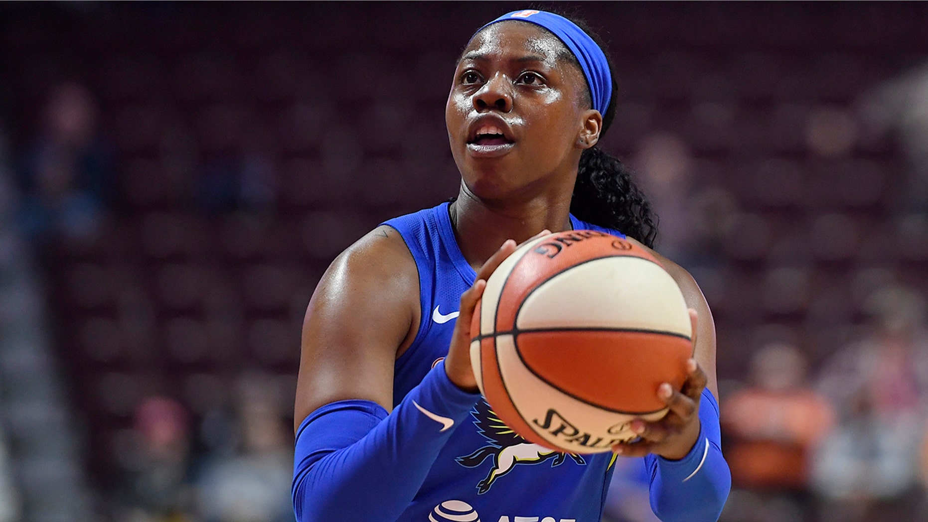 FILE - In this May 14, 2019, file photo, Dallas Wings' Arike Ogunbowale eyes the basket during the first half of the team's preseason WNBA basketball game against the Connecticut Sun in Uncasville, Conn. Ogunbowale hasn’t let losing shake her confidence. The fifth pick in the draft by the Dallas Wings has already lost more games in her rookie season then she did in her college career at Notre Dame. (AP Photo/Jessica Hill, File)