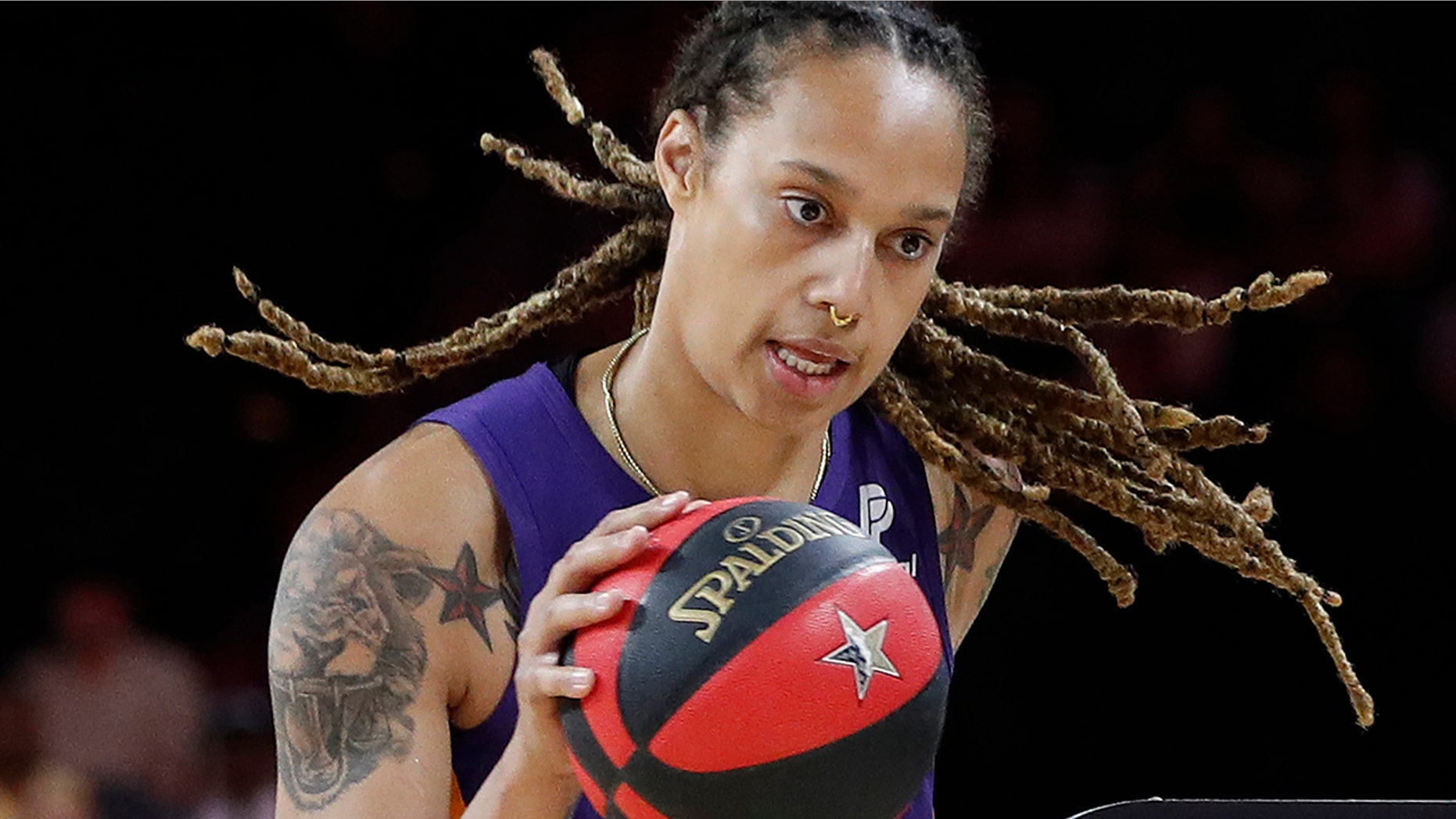 FILE - In this July 26, 2019, file photo, Phoenix Mercury's Brittney Griner competes in the skills challenge during the WNBA All-Star festivities in Las Vegas. The Mercury have been ravaged by injuries lately and may be without Brittney Griner for three games because of her role in the fight that occurred against Dallas last Saturday, Aug. 10. (AP Photo/John Locher, File)