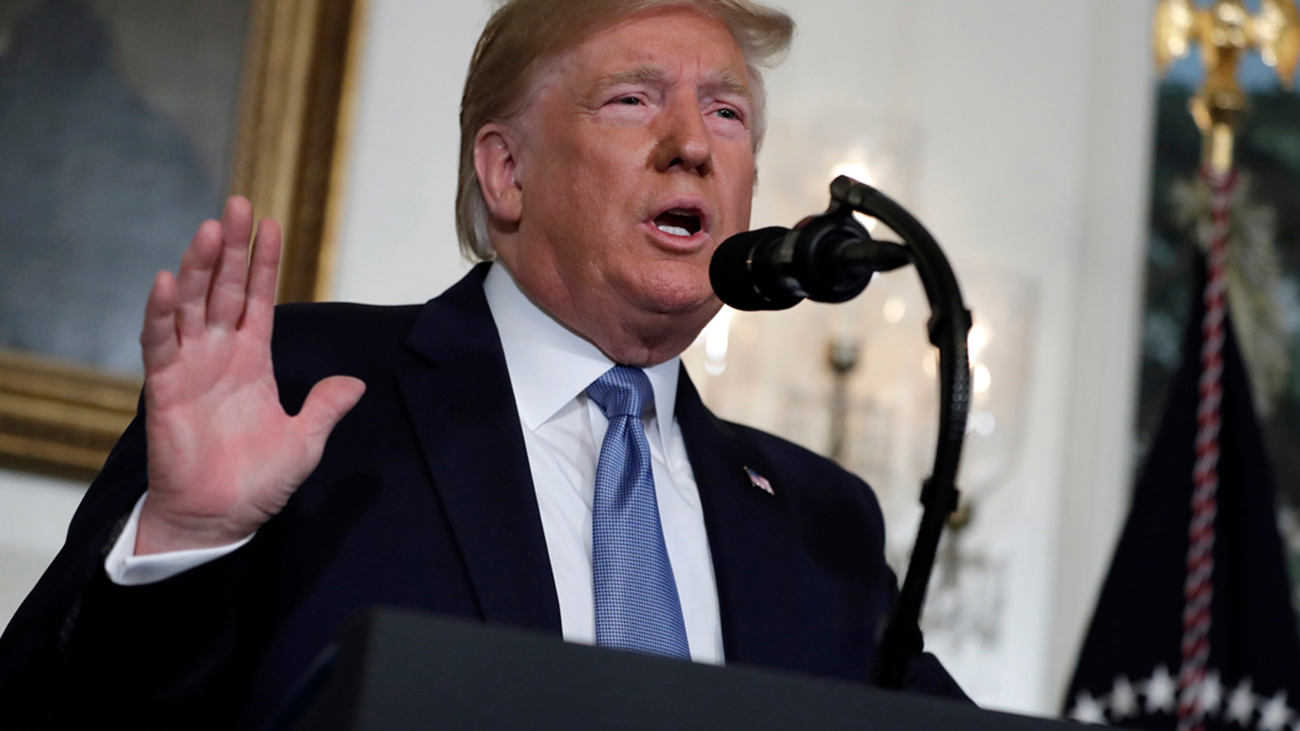 FILE - In this Monday, Aug. 5, 2019, file photo, President Donald Trump speaks about the mass shootings in El Paso, Texas and Dayton, Ohio, in the Diplomatic Reception Room of the White House, in Washington. Scientific studies have found no link between video games and violent behavior. An online manifesto thought to be authored by the gunman in El Paso briefly mentioned the combat game Call of Duty. Then Trump weighed in, charging Monday that gruesome and grisly video games contribute to a glorification of violence. (AP Photo/Evan Vucci, File)