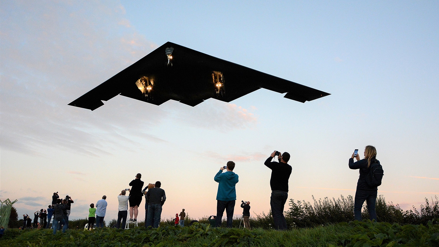 The Northrop Grumman B-2 Stealth Bomber comes in to land at RAF Fairford, Gloucestershire on September 11th, 2019 - Close up underneath photos of the B-2 bombers - the world's most expensive and secretive planes - returning from a training exercise from Iceland.
