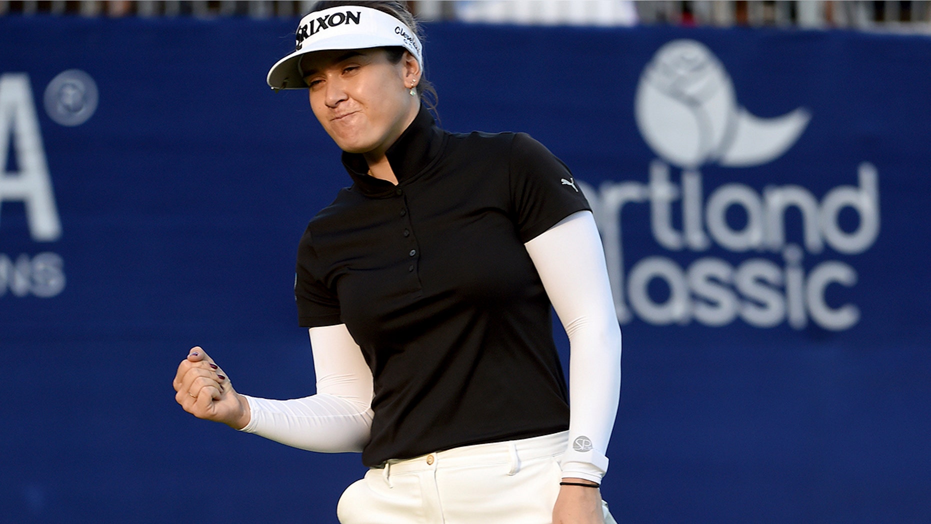 Hannah Green, of Australia, reacts as she sinks a putt on the 18th hole to win the LPGA Cambia Portland Classic golf tournament in Portland, Ore., Sunday, Sept. 1, 2019. (AP Photo/Steve Dykes)