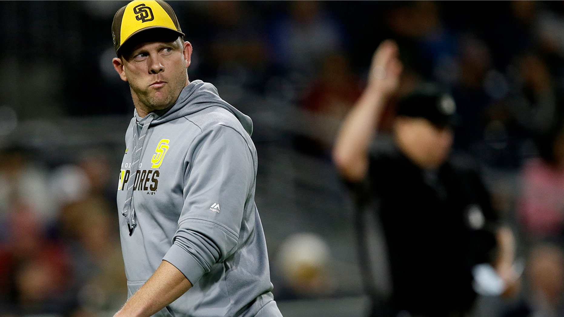 San Diego Padres manager Andy Green walks off the field during the eighth inning of the team's baseball game against the Arizona Diamondbacks in San Diego, Friday, Sept. 20, 2019. (AP Photo/Alex Gallardo)