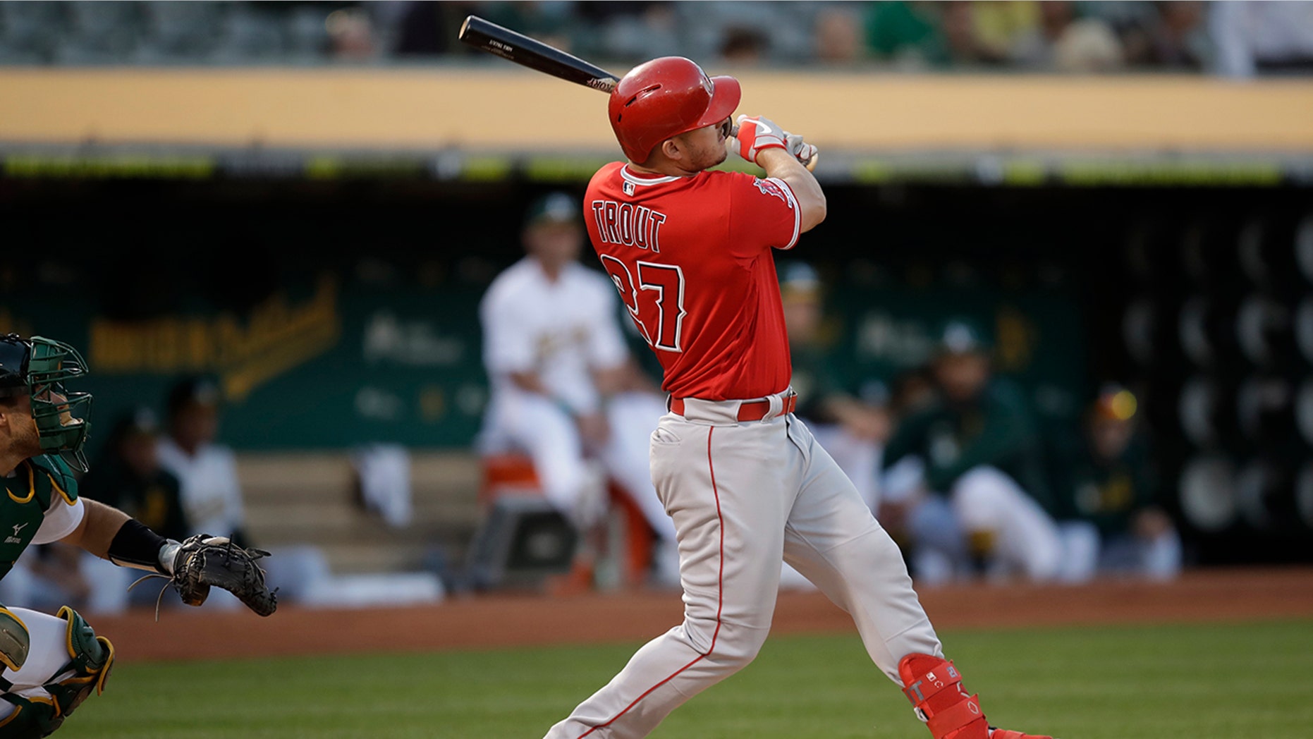 Los Angeles Angels' Mike Trout watches his home run off Oakland Athletics pitcher Mike Fiers during the first inning of a baseball game Tuesday, Sept. 3, 2019, in Oakland, Calif. (AP Photo/Ben Margot)
