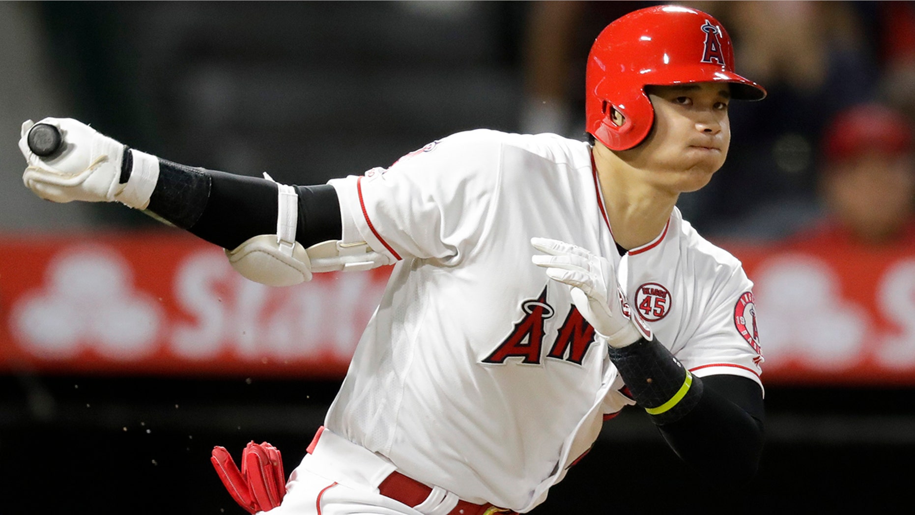 Los Angeles Angels' Shohei Ohtani, of Japan, watches a foul ball during the third inning of a baseball game against the Cleveland Indians in Anaheim, Calif., Monday, Sept. 9, 2019. (AP Photo/Chris Carlson)