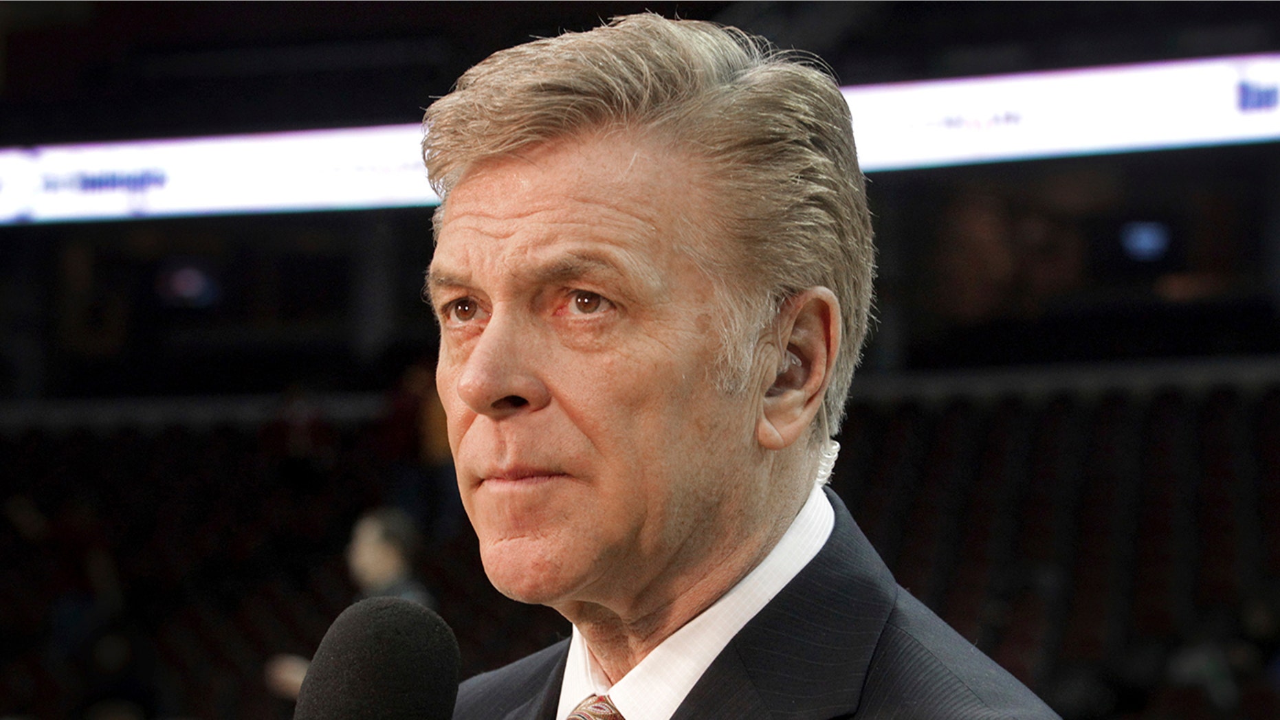 In this Feb. 19, 2014, photo, longtime sportscaster and announcer Fred McLeod is shown at a Cleveland Cavaliers game in Cleveland. McLeod has died. He was 67. The Cavaliers said McLeod died suddenly Monday night, Sept. 9, 2019, but did not elaborate. They called him a "great friend and teammate" and a "heart-felt ambassador." (Lynn Ischay/The Plain Dealer via AP)