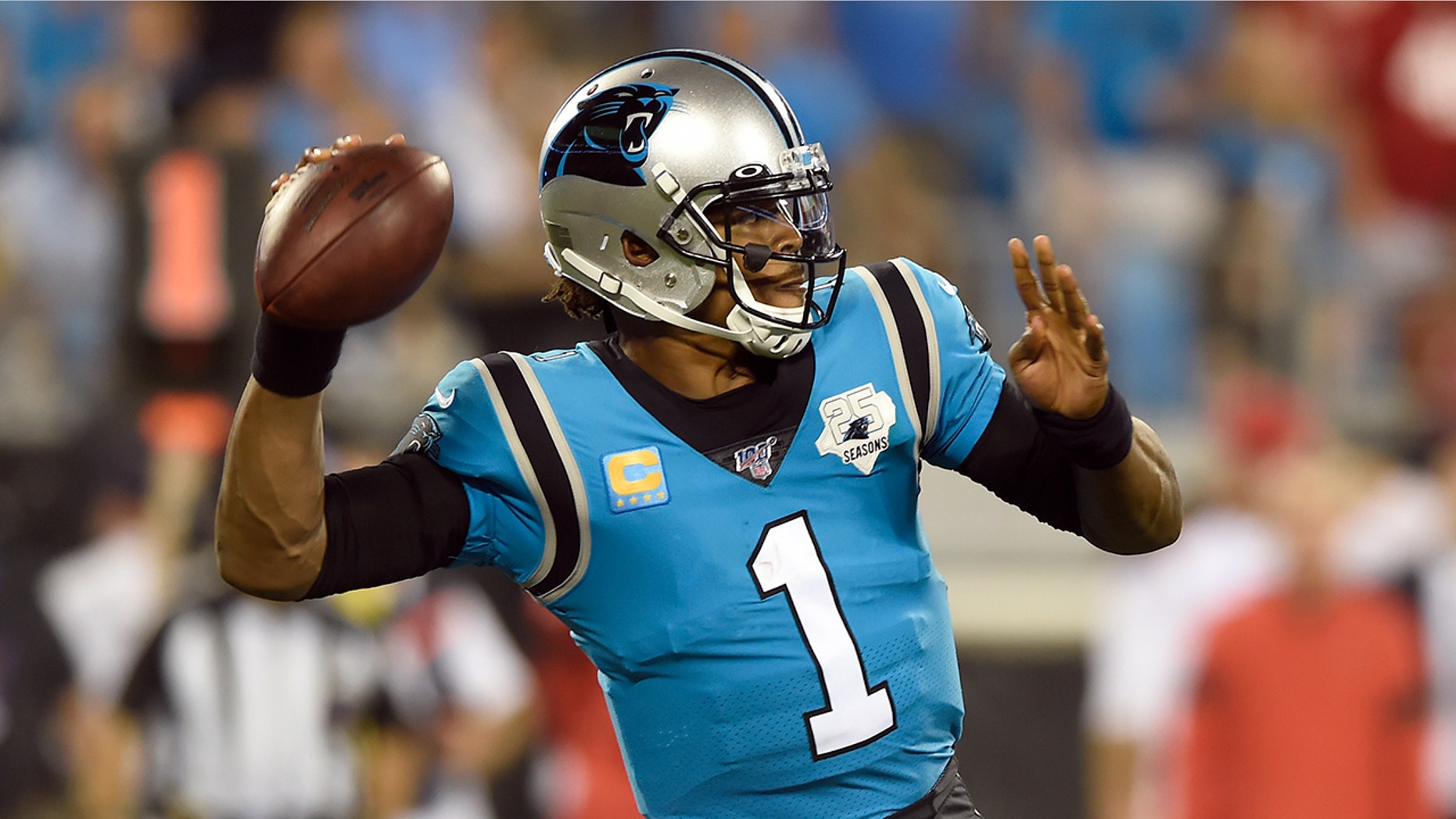 Carolina Panthers quarterback Cam Newton (1) passes against the Tampa Bay Buccaneers during the second half of an NFL football game in Charlotte, N.C., Thursday, Sept. 12, 2019. (AP Photo/Mike McCarn)