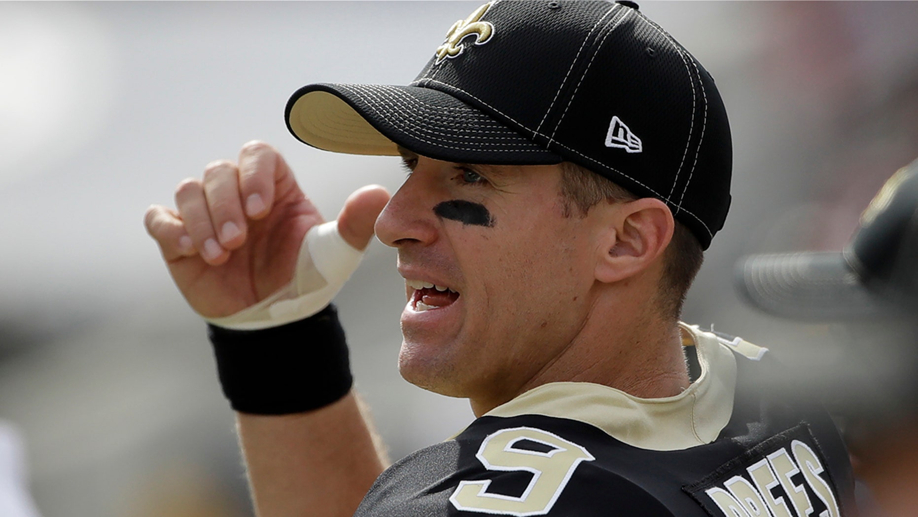 New Orleans Saints quarterback Drew Brees watches from the sidelines after getting hurt during the first half of an NFL football game against the Los Angeles Rams Sunday, Sept. 15, 2019, in Los Angeles. (AP Photo/Marcio Jose Sanchez)