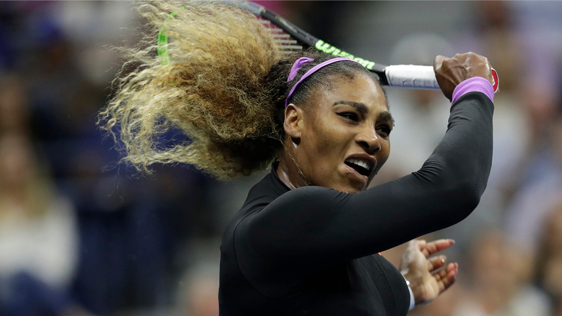 Serena Williams, of the United States, returns a shot to Elina Svitolina, of Ukraine, during the semifinals of the U.S. Open tennis championships Thursday, Sept. 5, 2019, in New York. (AP Photo/Adam Hunger)