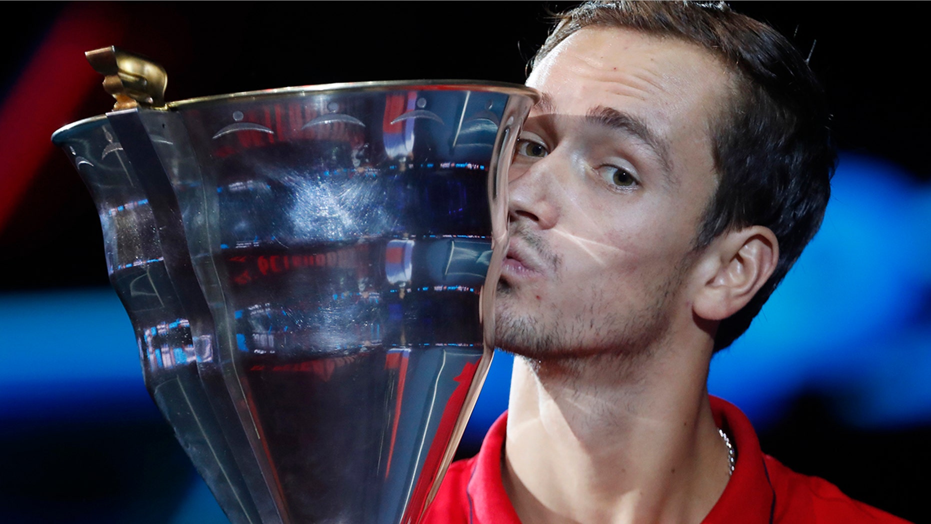 Daniil Medvedev of Russia kisses the trophy after winning the St. Petersburg Open ATP tennis tournament final match against Borna Coric of Croatia in St.Petersburg, Russia, Sunday, Sept. 22, 2019. (AP Photo/Elena Ignatyeva)