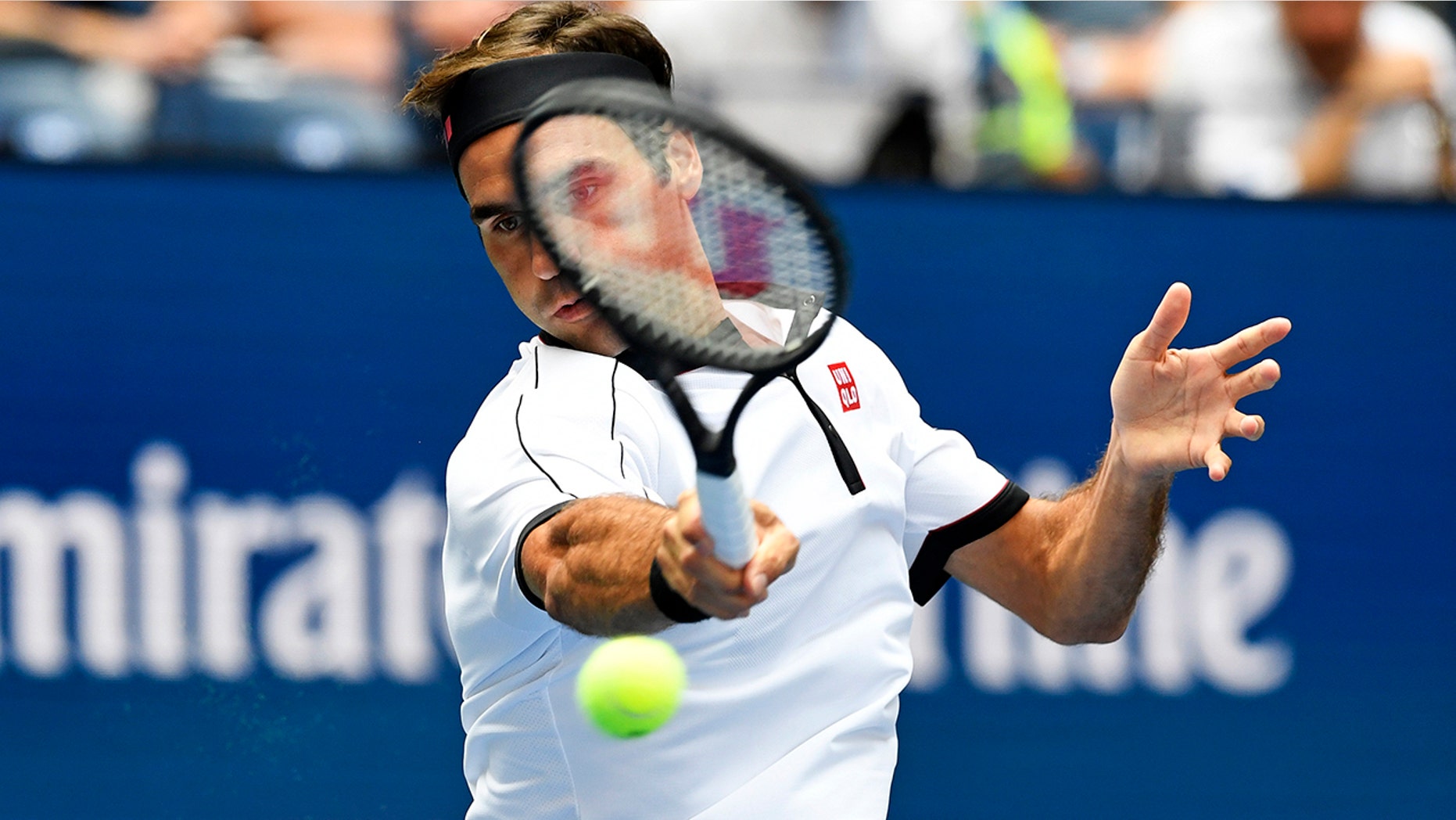 Roger Federer, of Switzerland, returns to David Goffin, of Belgium, during the fourth round of the US Open tennis championships Sunday, Sept. 1, 2019, in New York. (AP Photo/Sarah Stier)