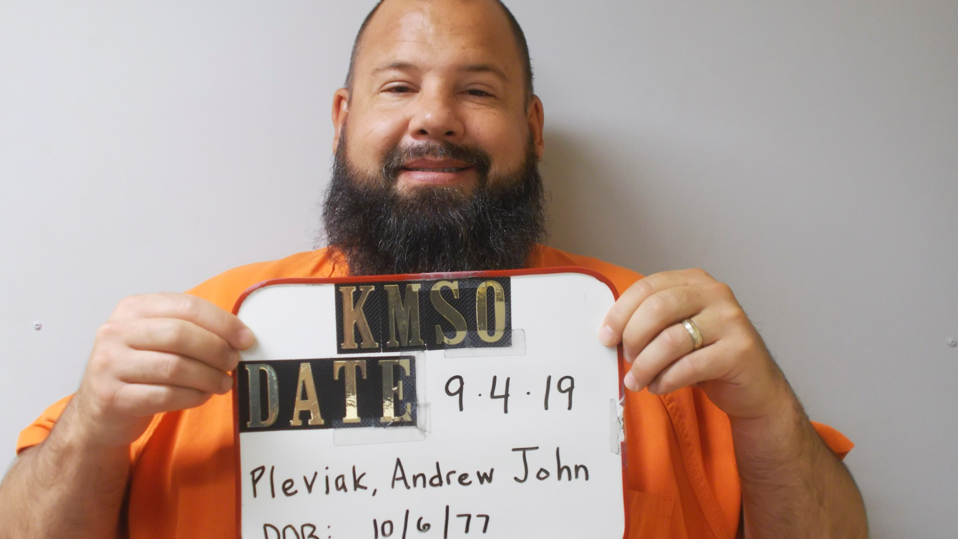 FILE -This Sept. 4, 2019 booking photo provided by the Kingman County Sheriff's Office shows Andrew John Pleviak. The former agent with U.S. Immigration and Customs Enforcement has pleaded guilty to helping an inmate try to escape from a Kansas jail by impersonating an immigration officer. Pleviak pleaded guilty Wednesday, Oct. 16, in Kingman County District Court to making false information and attempted aiding of escape. He's also charged in federal court with false impersonation of a federal officer. (Kingman County Sheriff's Office via AP)