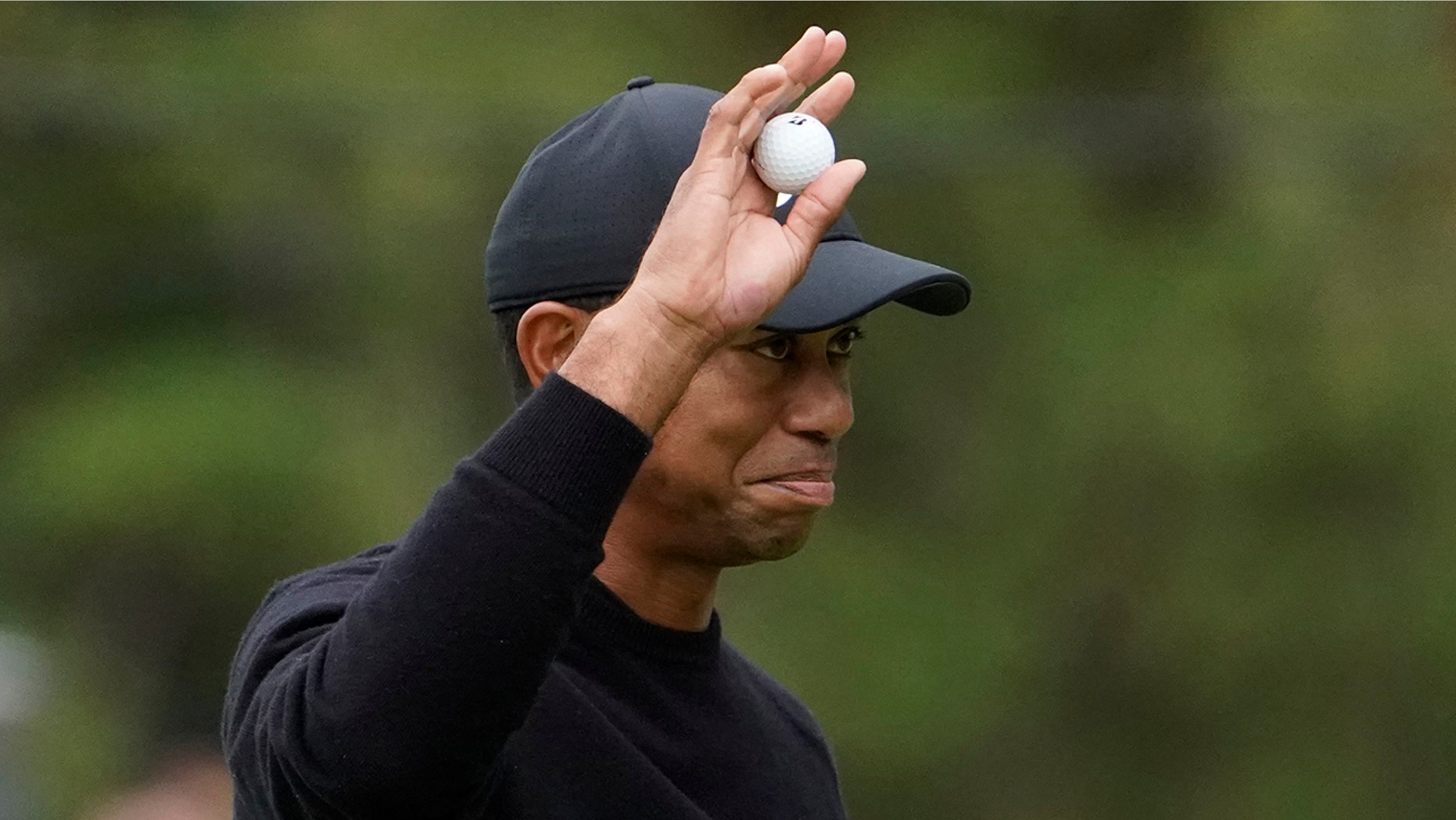Tiger Woods of the United States waves for his fans on the 9th hole after finishing the first round of the Zozo Championship PGA Tour at the Accordia Golf Narashino country club in Inzai, east of Tokyo, Japan, Thursday, Oct. 24, 2019. (AP Photo/Lee Jin-man)