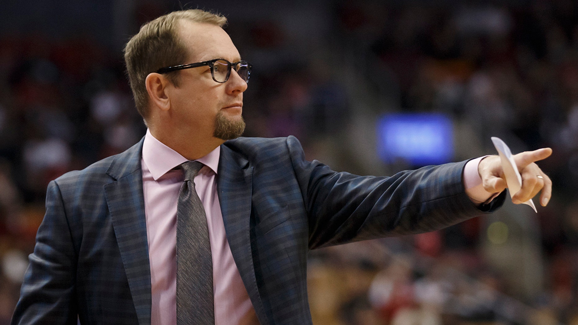 Toronto Raptors head coach Nick Nurse points during the first half of a preseason NBA basketball game against the Chicago Bulls in Toronto, Sunday, Oct. 13, 2019. (Cole Burston/The Canadian Press via AP)