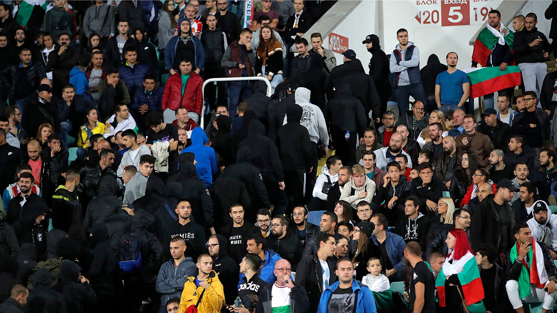Bulgarian fans leave the stadium during the Euro 2020 group A qualifying soccer match between Bulgaria and England, at the Vasil Levski national stadium, in Sofia, Bulgaria, Monday, Oct. 14, 2019. (AP Photo/Vadim Ghirda)