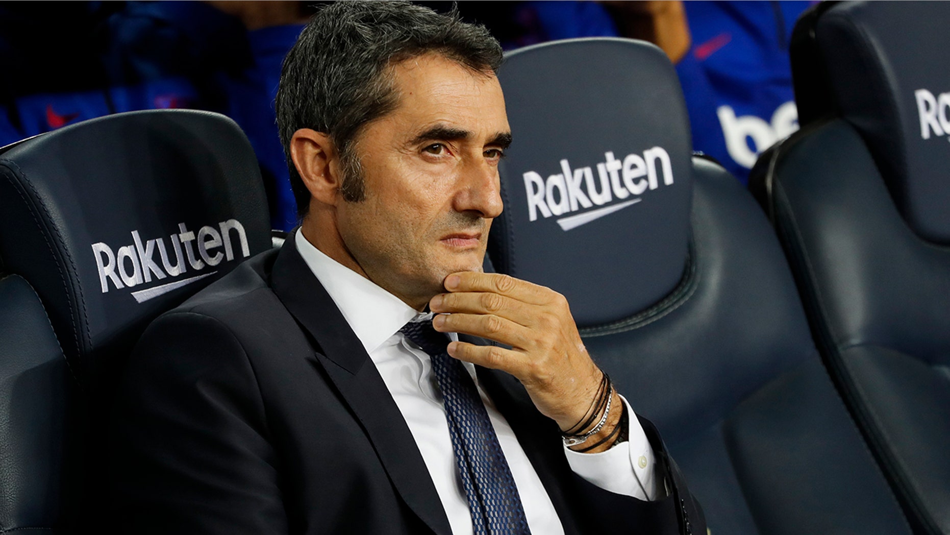 Barcelona head coach Ernesto Valverde sits prior Spanish La Liga soccer match between Barcelona and Sevilla at the Camp Nou stadium in Barcelona, Sunday, Oct. 6, 2019. Barcelona won 4-0. (AP Photo/Joan Monfort)