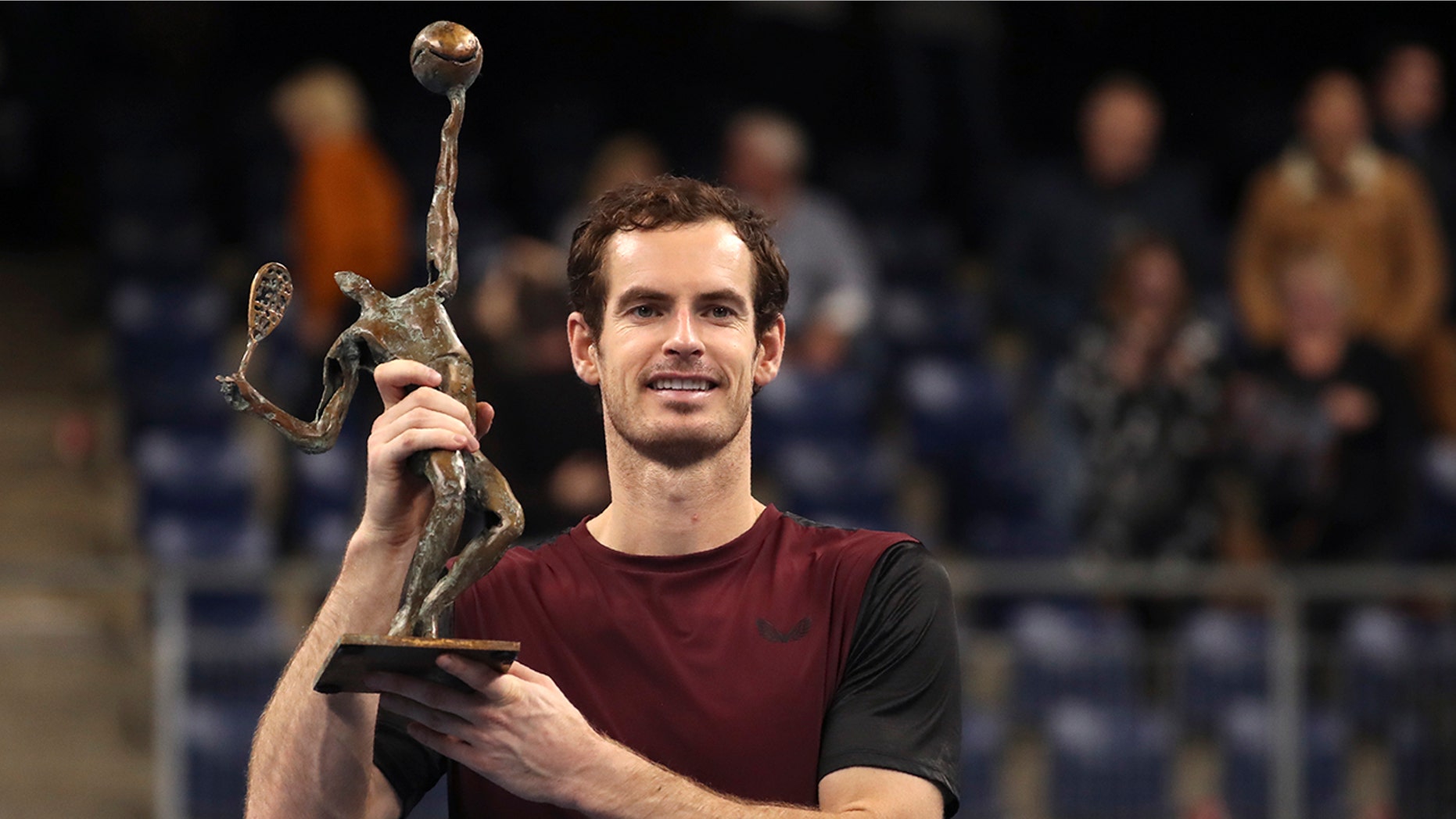 Andy Murray of Britain poses with the trophy after winning the European Open final tennis match in Antwerp, Belgium, Sunday, Oct. 20, 2019. Murray defeated Stan Wawrinka of Switzerland 3-6/6-4/6-4. (AP Photo/Francisco Seco)