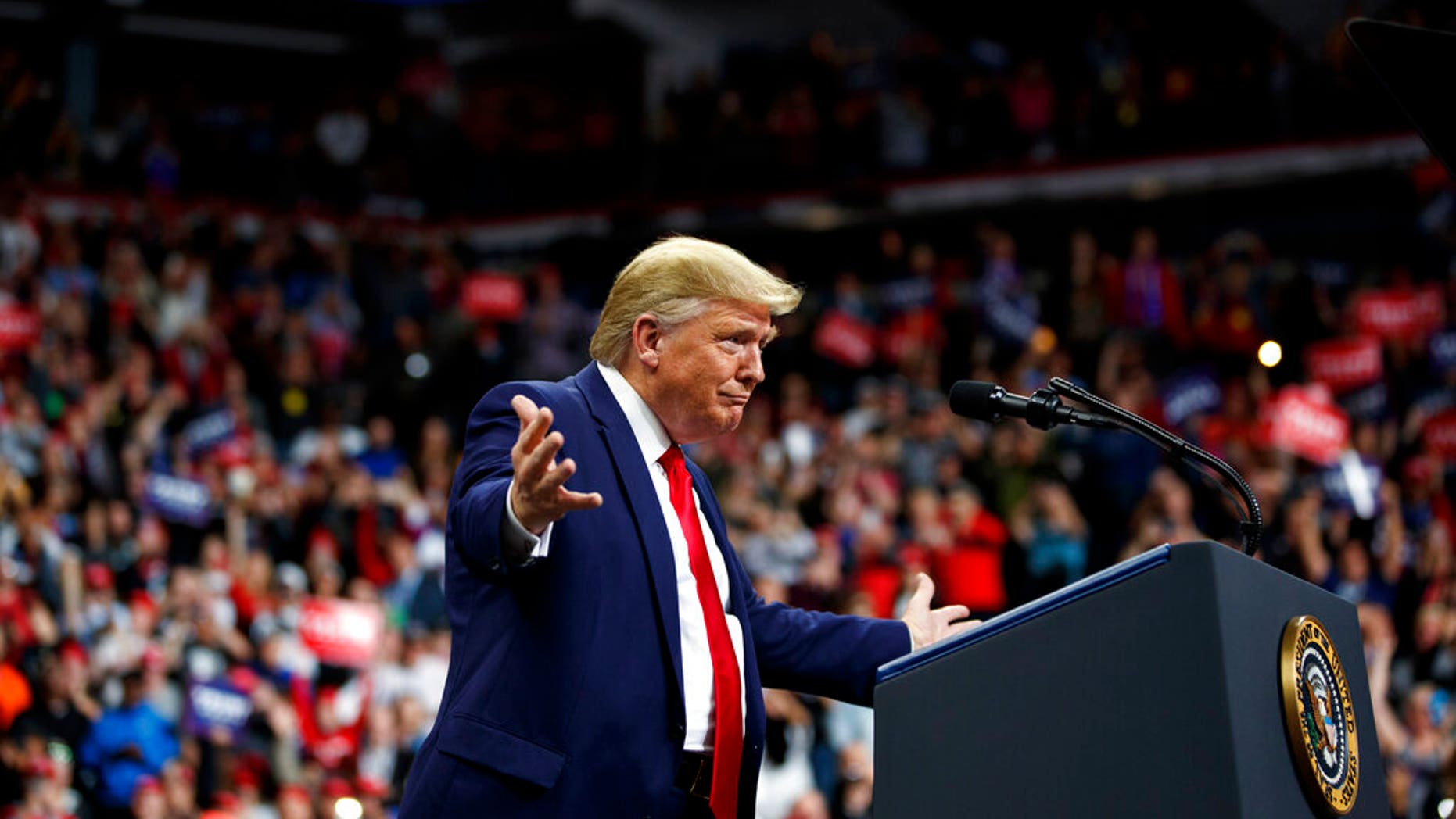 President Donald Trump arrives to speak at a campaign rally at the Target Center, Thursday, Oct. 10, 2019, in Minneapolis. (AP Photo/Evan Vucci)
