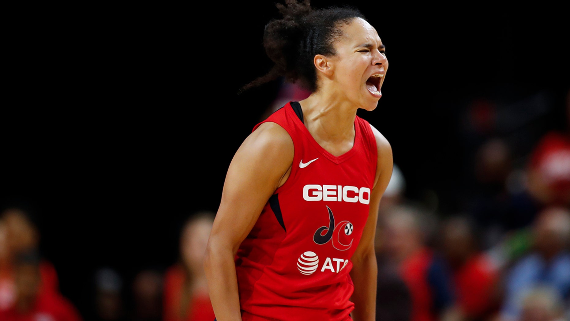 Washington Mystics guard Kristi Toliver reacts during the second half of Game 5 of basketball's WNBA Finals against the Connecticut Sun, Thursday, Oct. 10, 2019, in Washington. (AP Photo/Alex Brandon)