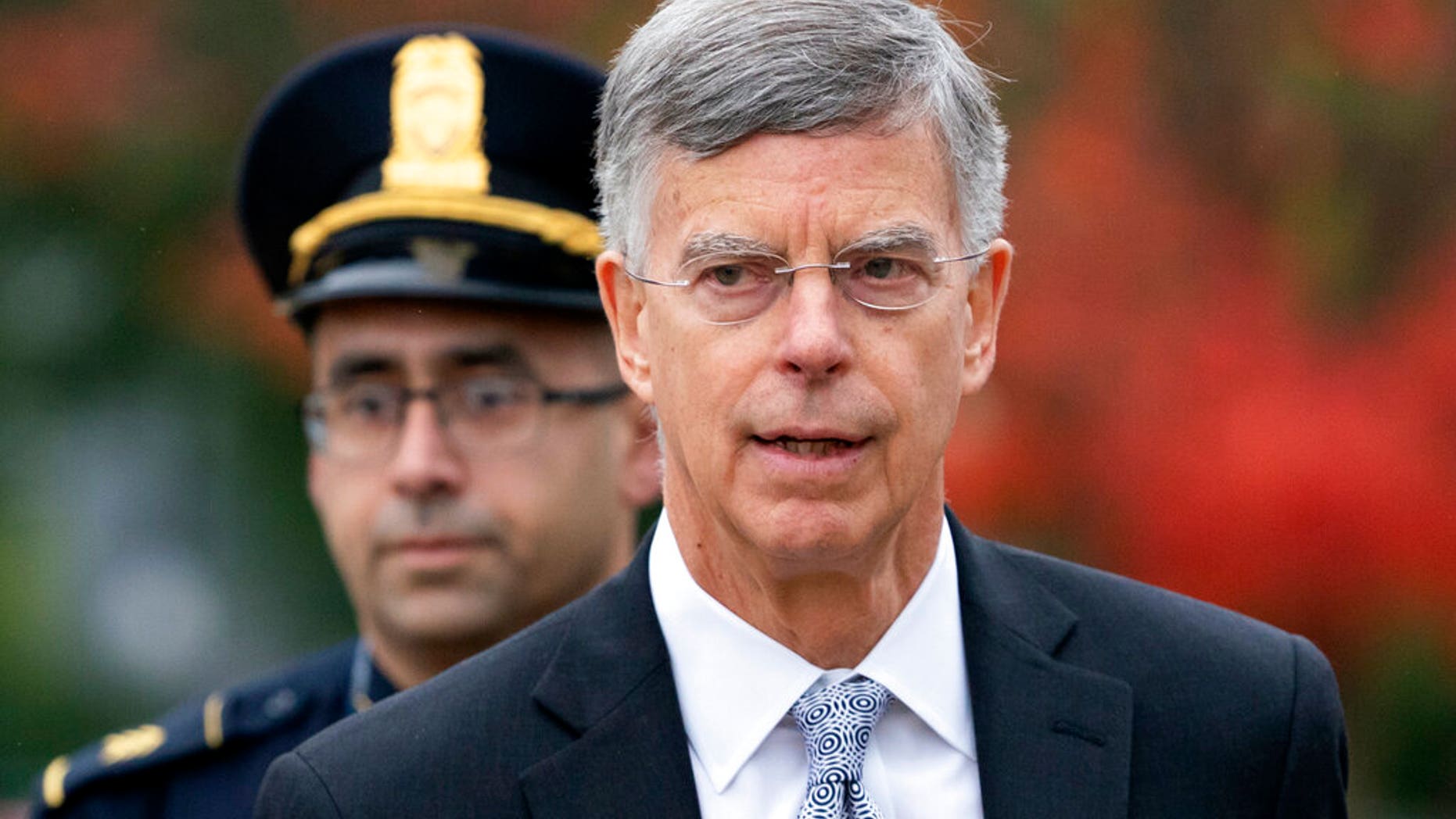 Ambassador William Taylor is escorted by U.S. Capitol Police as he arrives to testify before House committees as part of the Democrats' impeachment investigation of President Donald Trump, at the Capitol in Washington, Tuesday, Oct. 22, 2019. (AP Photo/J. Scott Applewhite)