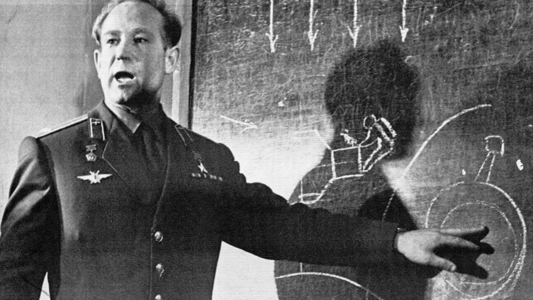 FILE - In this March 26, 1965 file photo, Cosmonaut Alexei Leonov, who stepped into space from the Voskod-2 spaceship, speaks in Moscow, Russia. Alexei Leonov, the first human to walk in space, died in Moscow on Friday, Oct. 11, 2019. He was 85. (AP Photo, File)