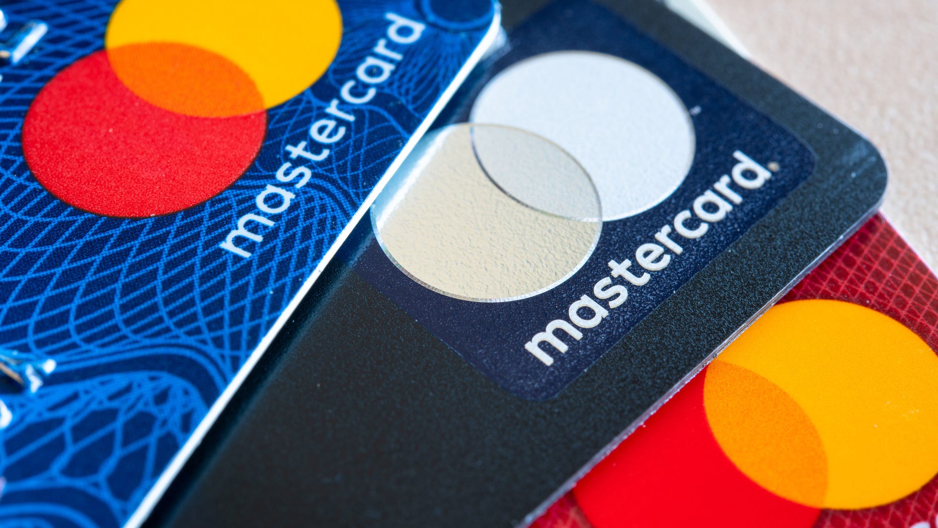 Kim Komando explains the five ways that criminals are coming after your credit cards. In this photo illustration there are three Mastercard Credit Cards. (Photo Illustration by Roberto Machado Noa/LightRocket via Getty Images)